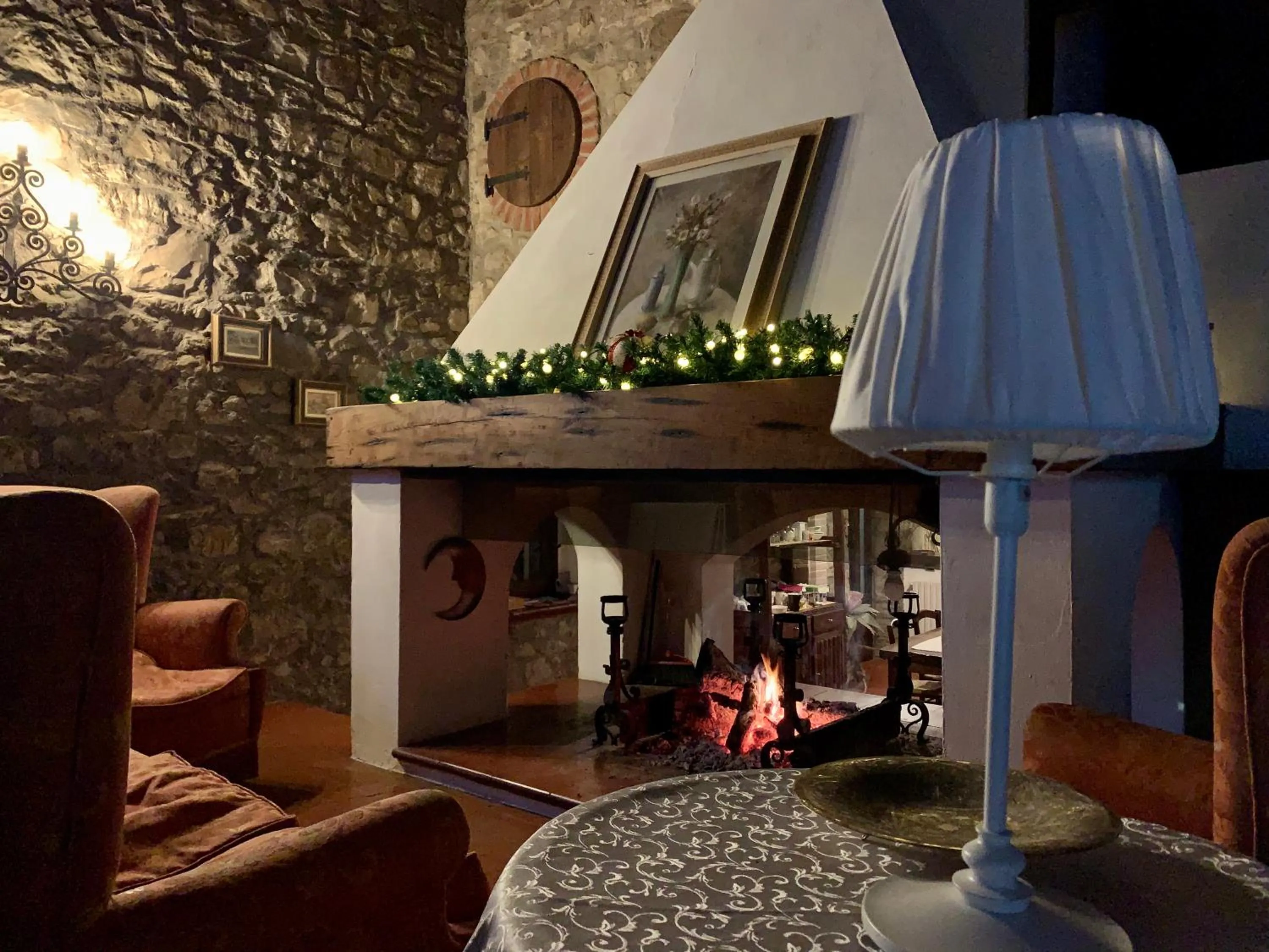 Communal lounge/ TV room in B&B Appartamenti Villa del lago