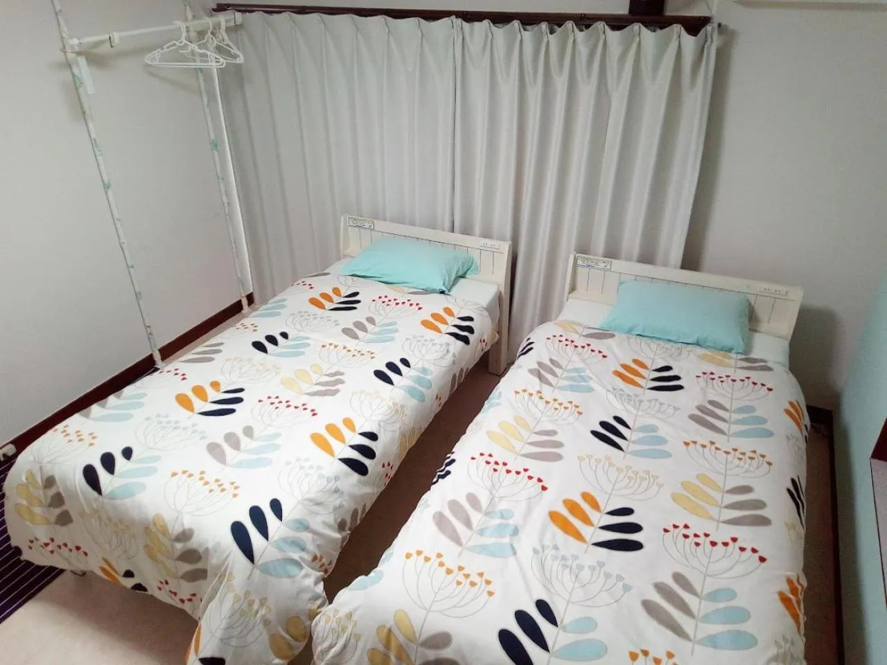 Bedroom, Bed in Mike's B&B Tokoname