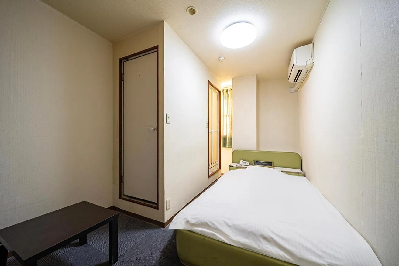 Bed in Hotel Xenia Takinoyashiro