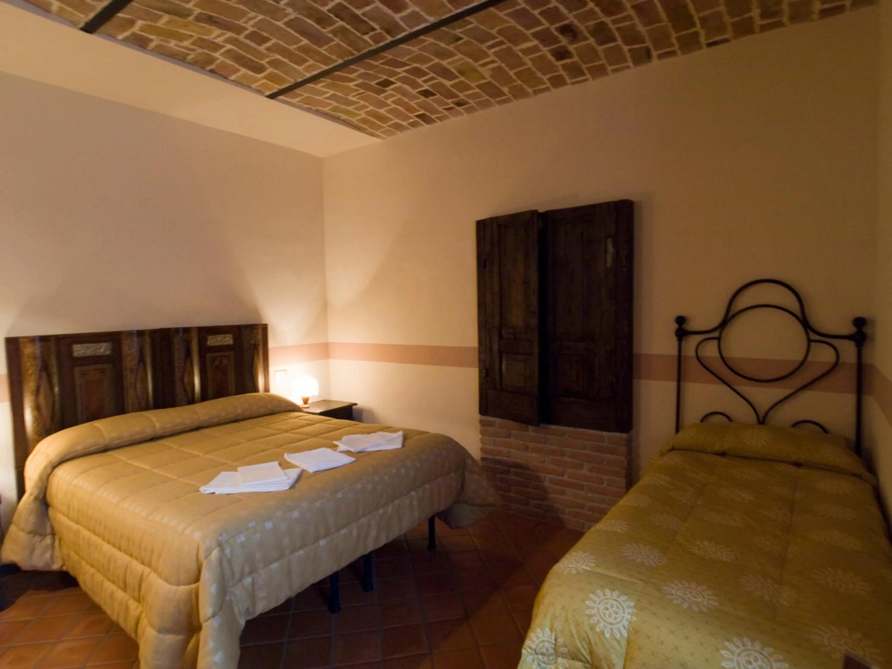 Bed in La Casa Sù Le Dimore Del Borgo