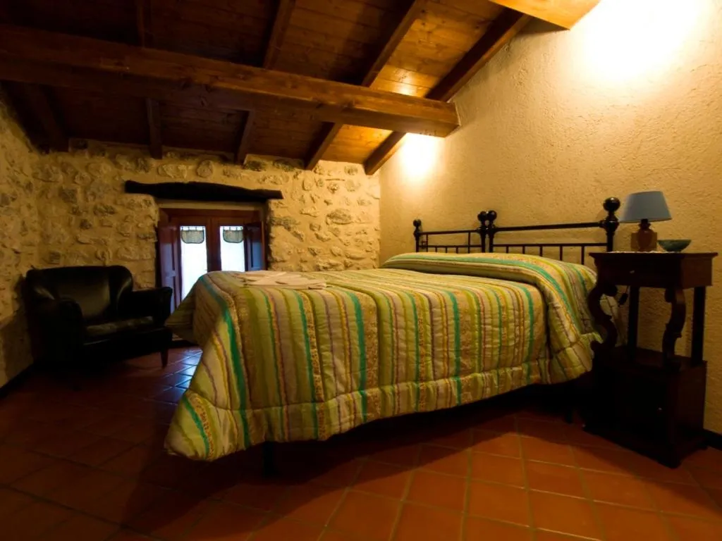 Bed in La Casa Sù Le Dimore Del Borgo