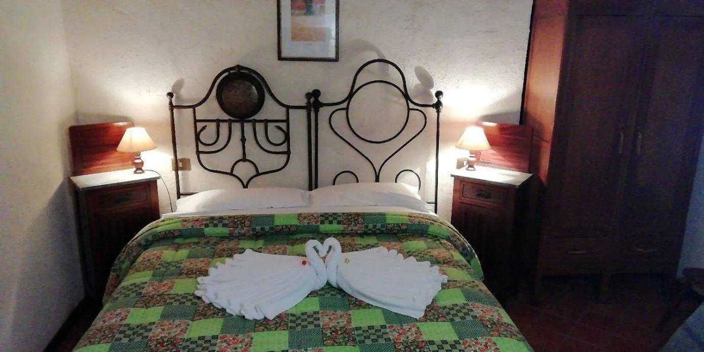 Bed in La Casa Sù Le Dimore Del Borgo