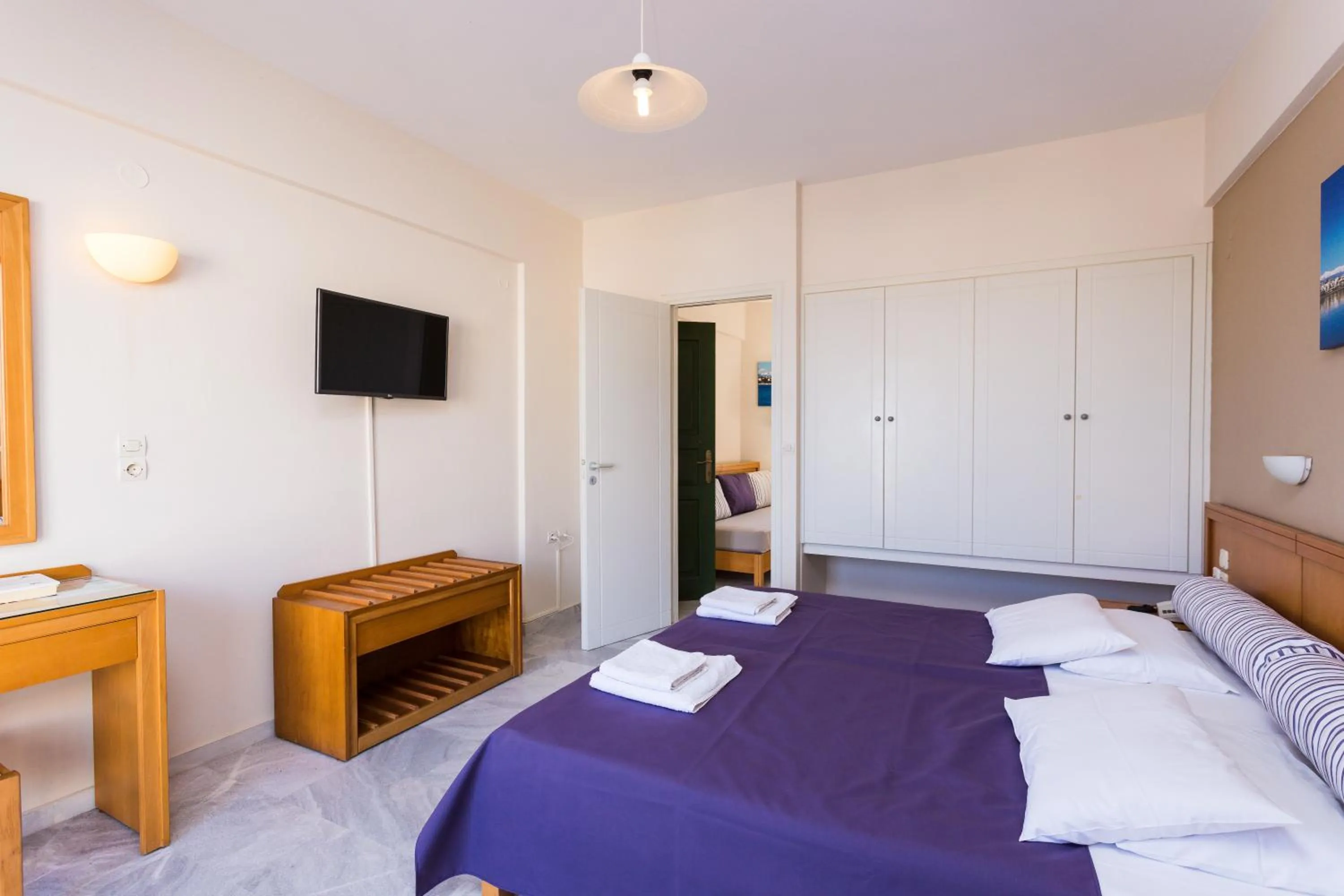 Bedroom, Bed in Radamanthy's Hotel Apartments