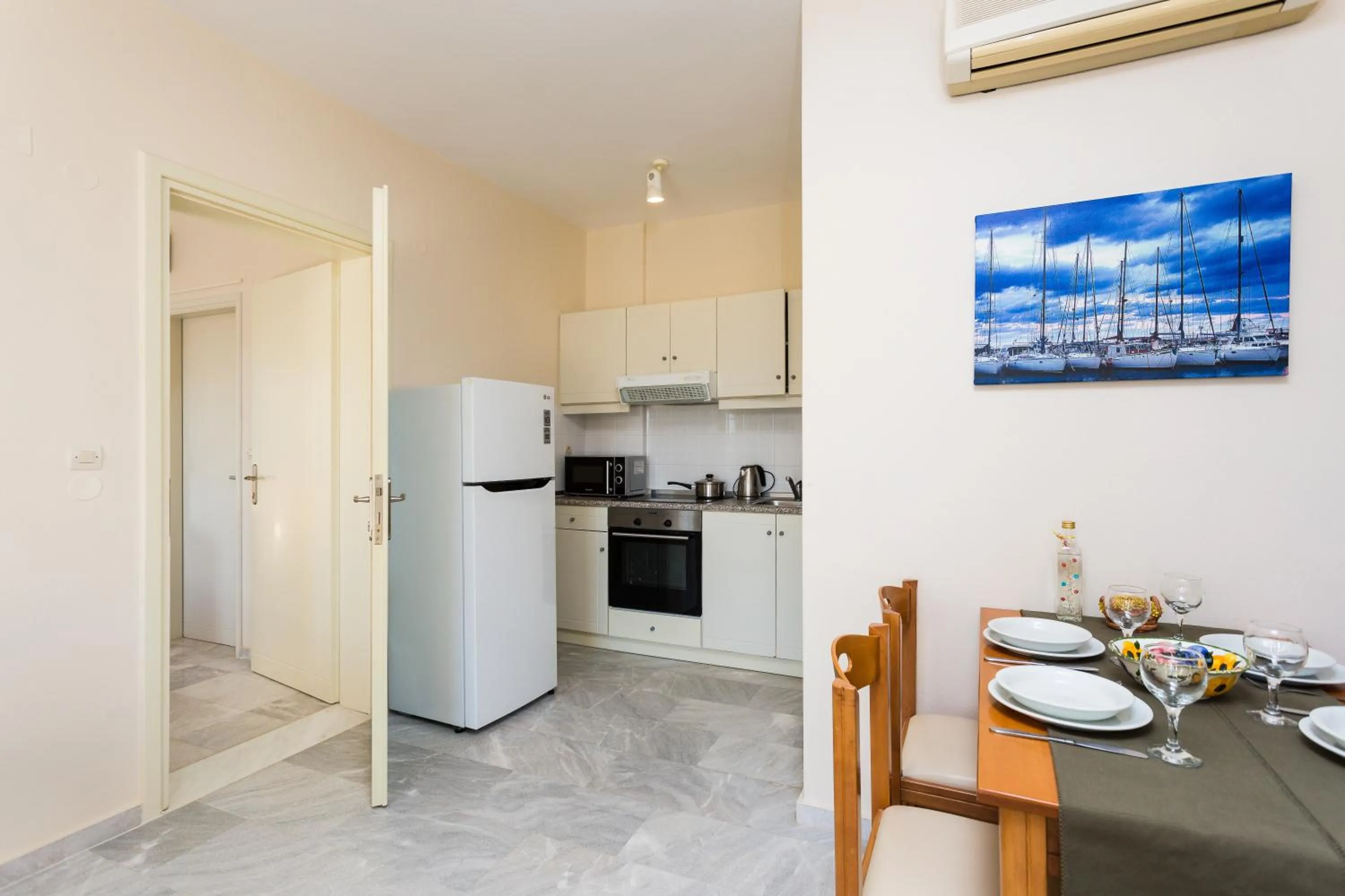 Kitchen or kitchenette in Radamanthy's Hotel Apartments