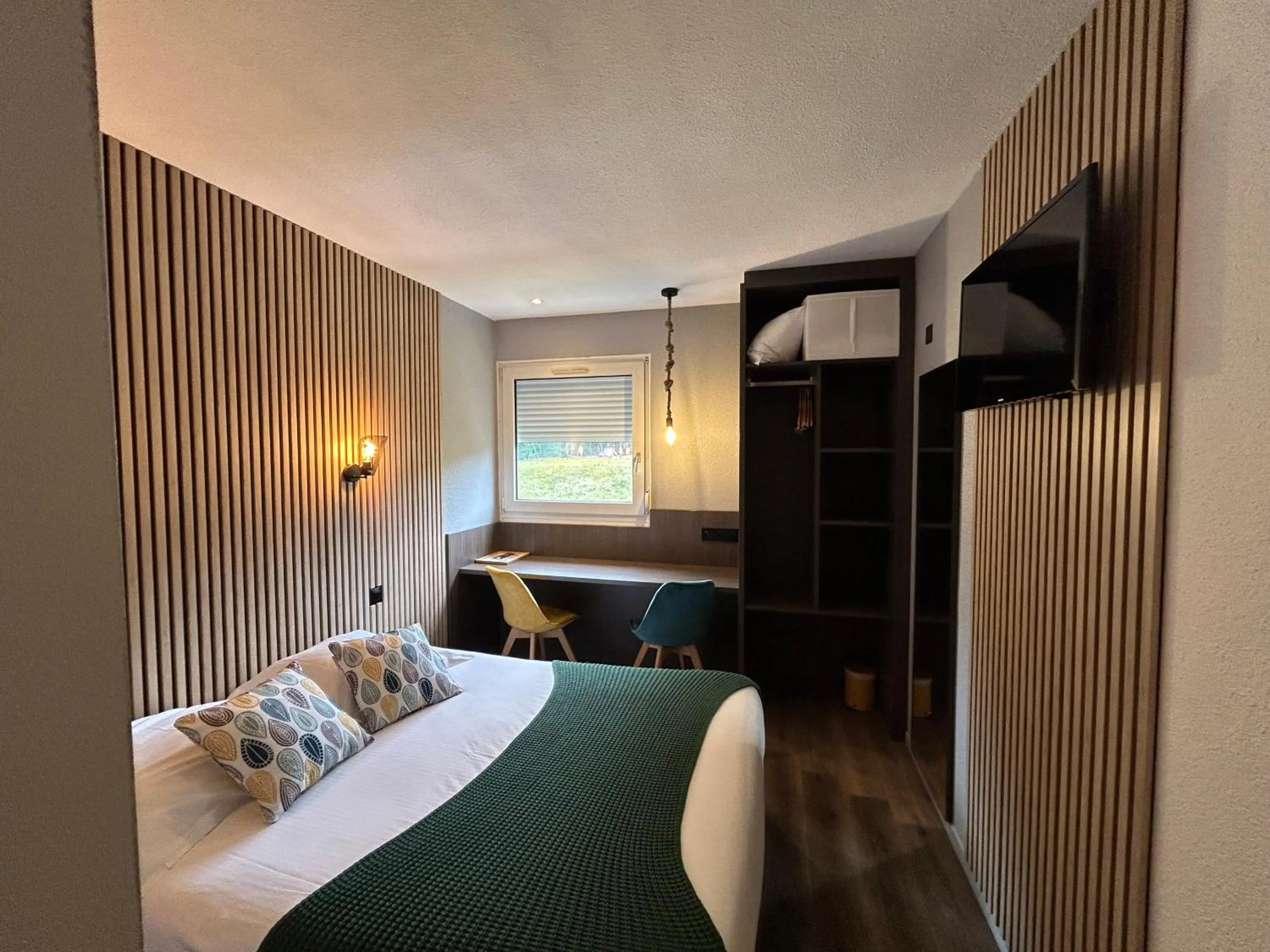 Bed in Les Orchidées , Hôtel & Restaurant