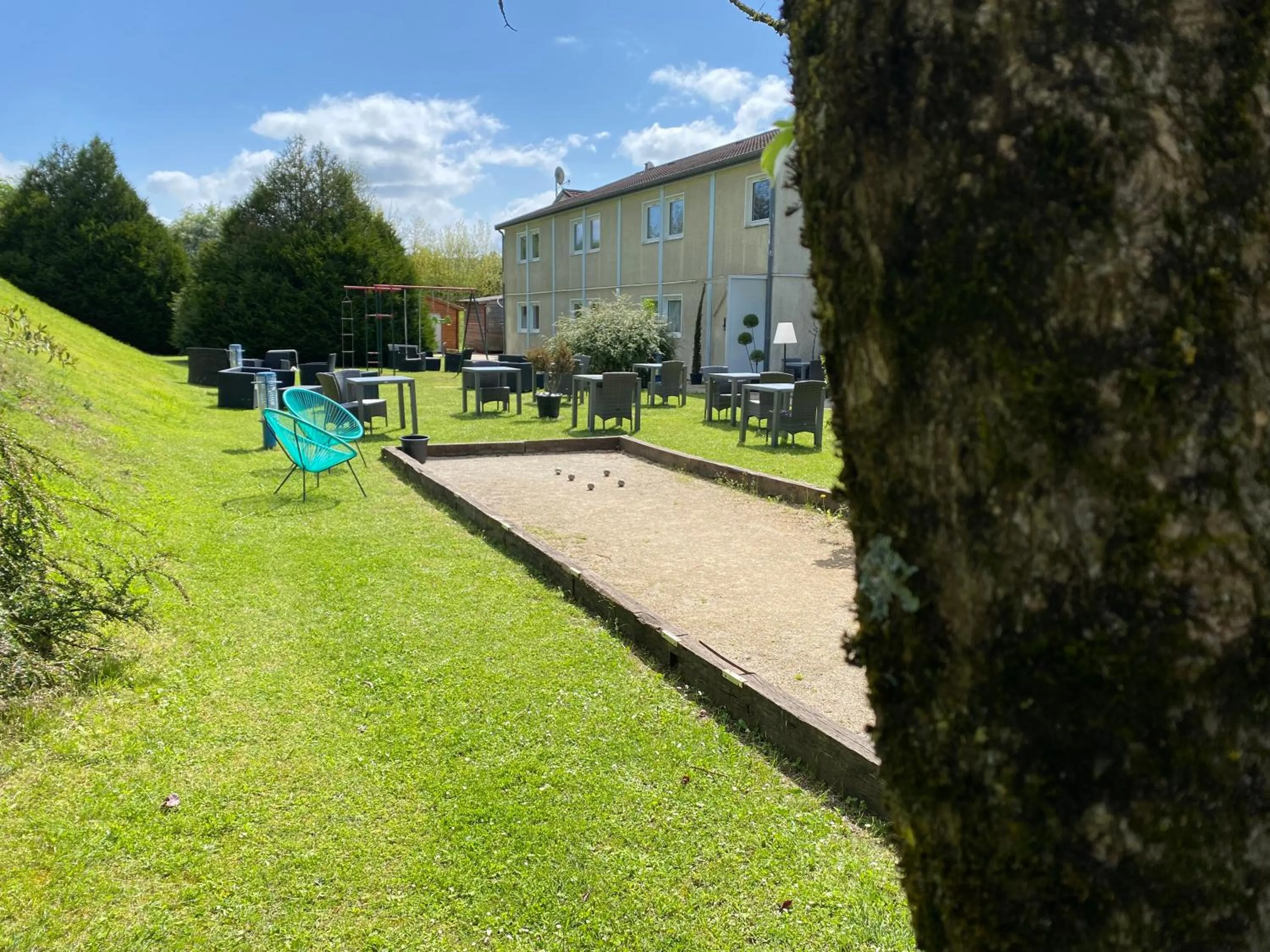 Garden in Les Orchidées , Hôtel & Restaurant