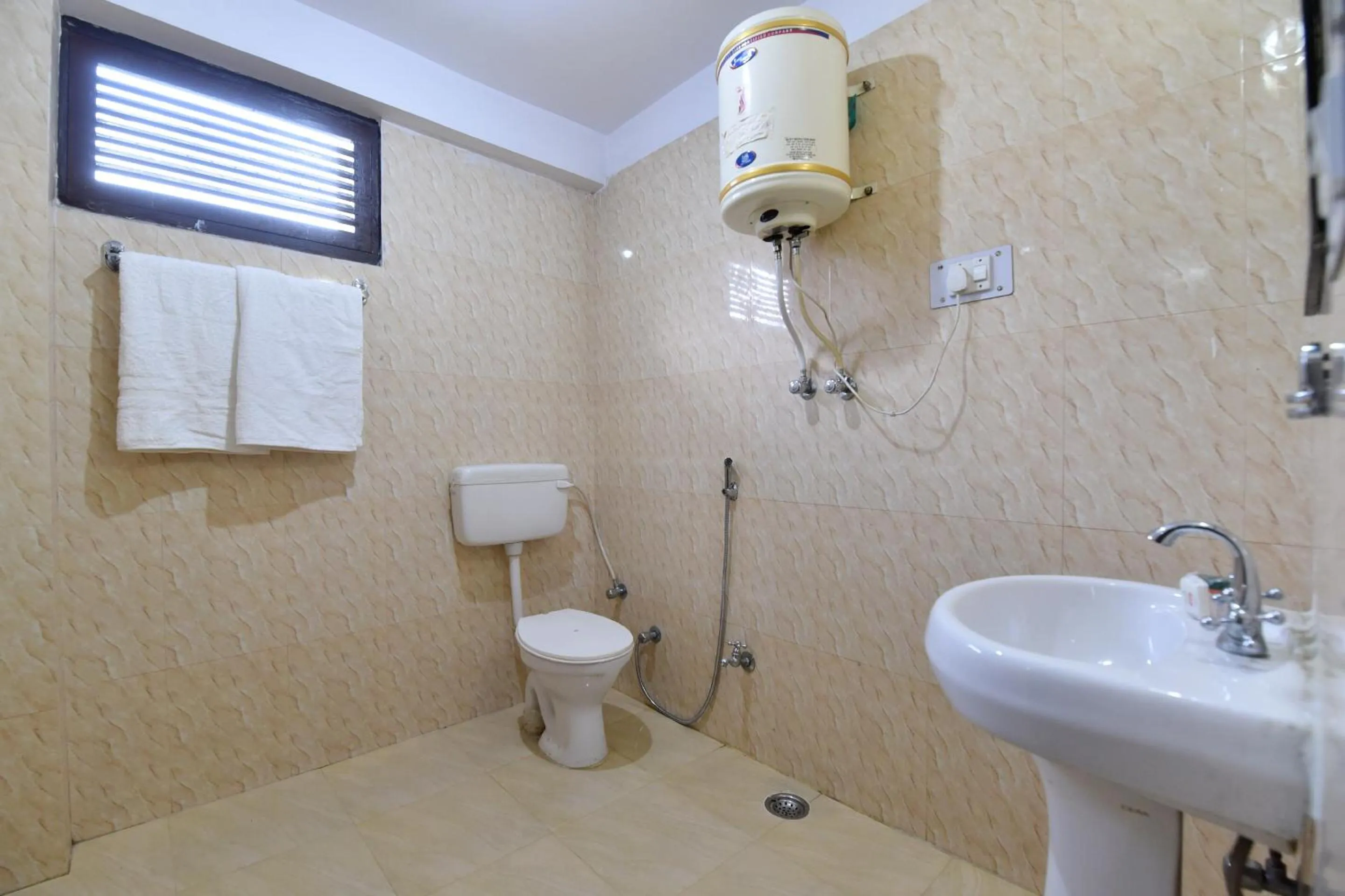 Bathroom in OYO Hill View