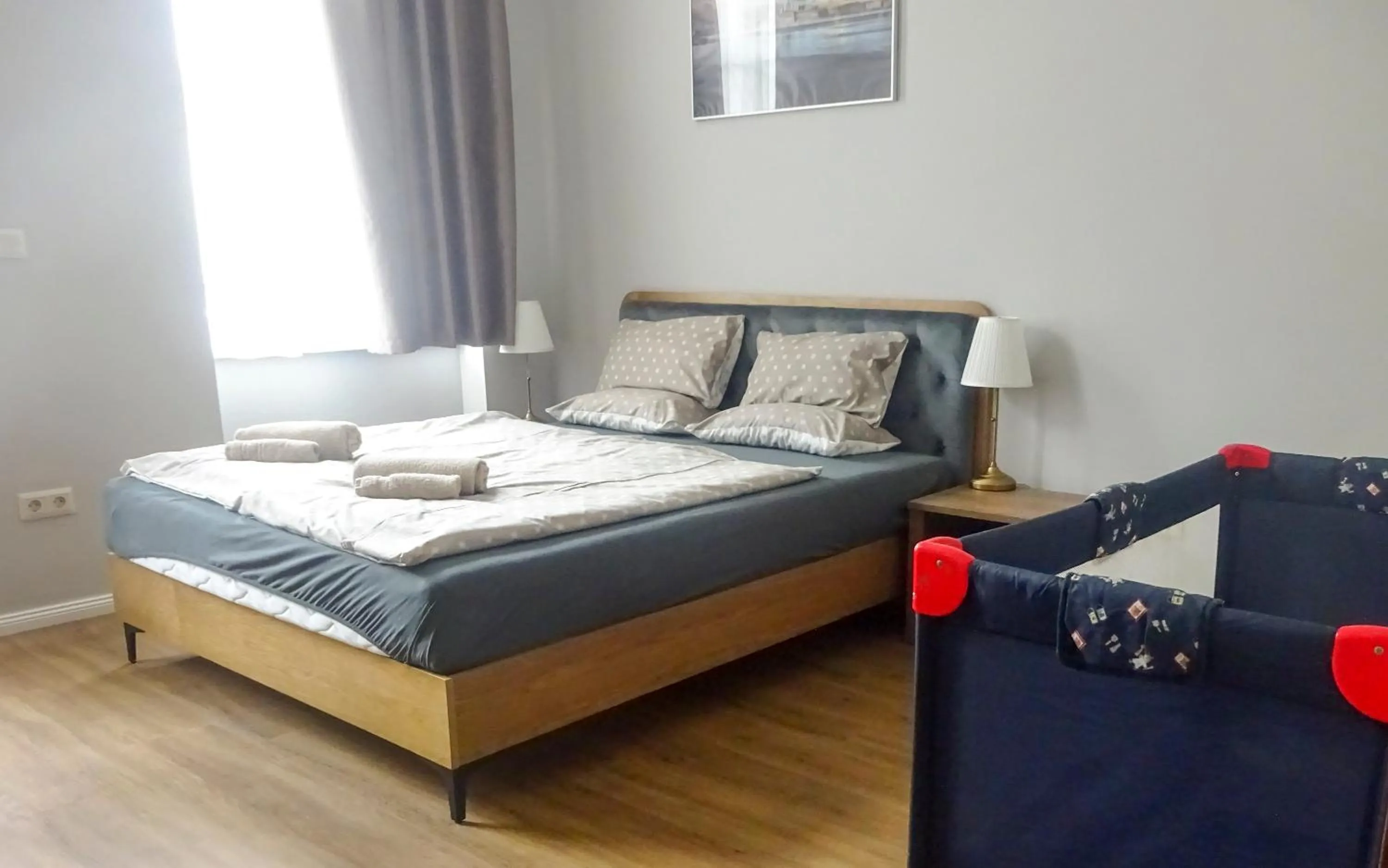 Bed in Corvin Point Rooms and Apartments