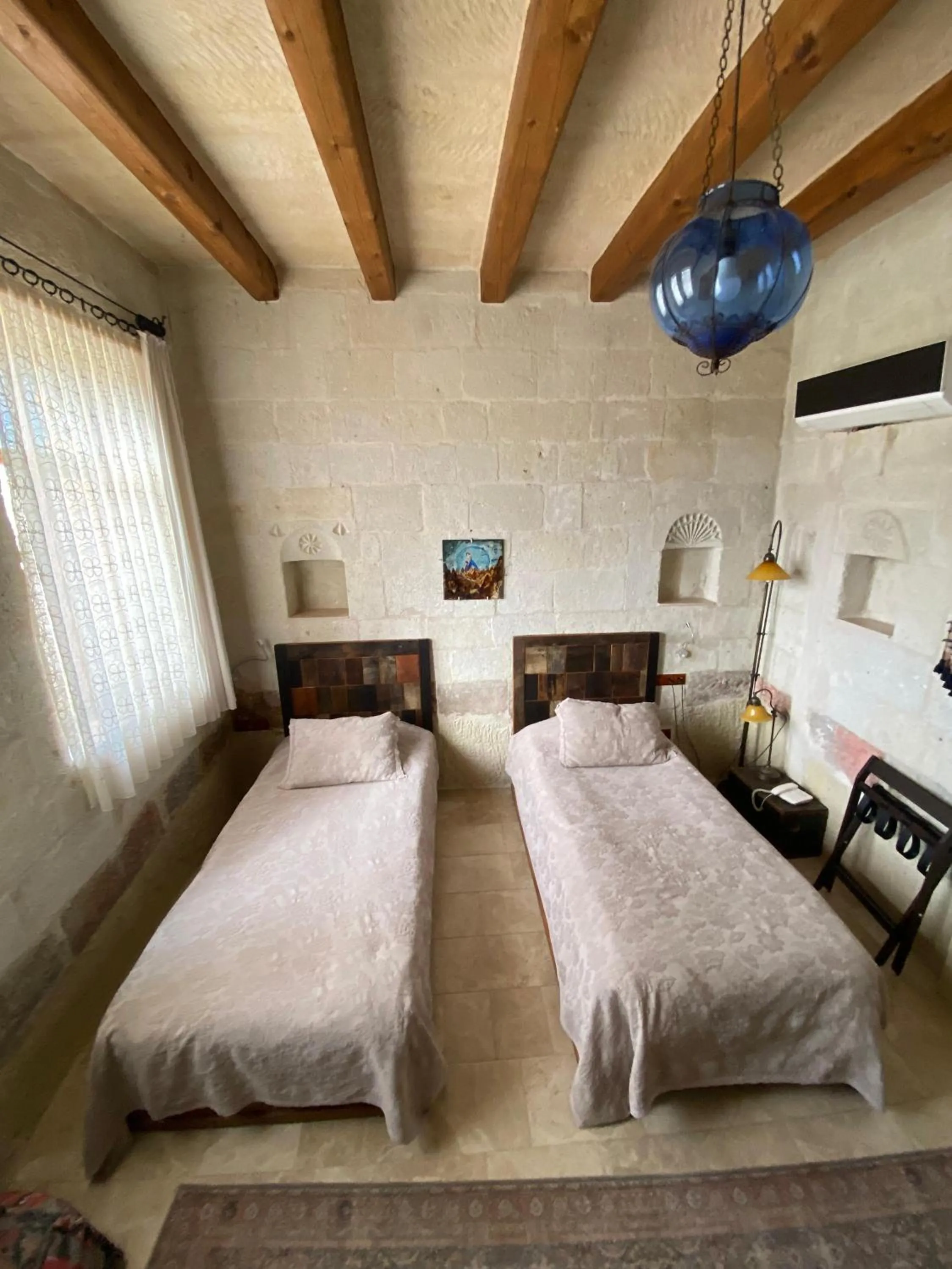 Bed in Seki Cave Suites