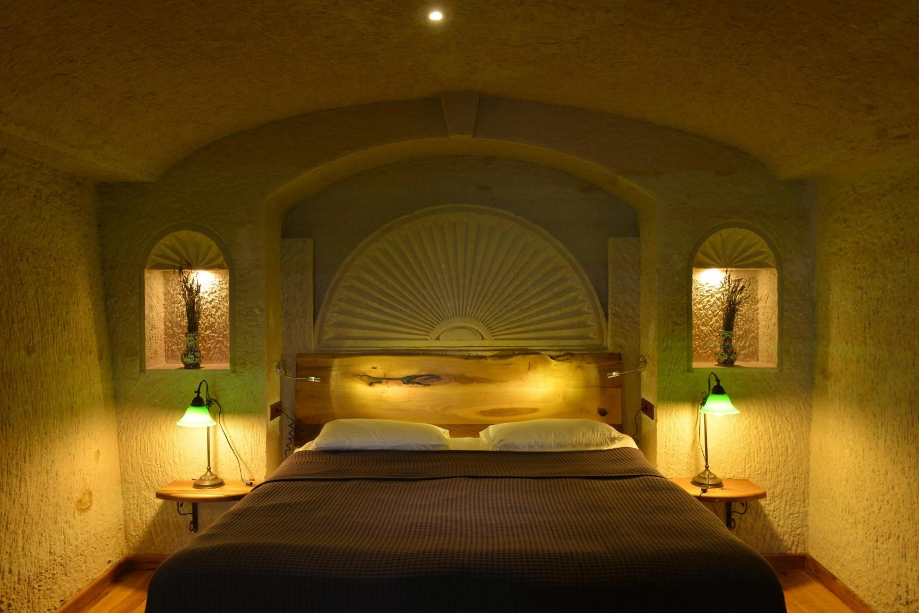 Bed in Seki Cave Suites