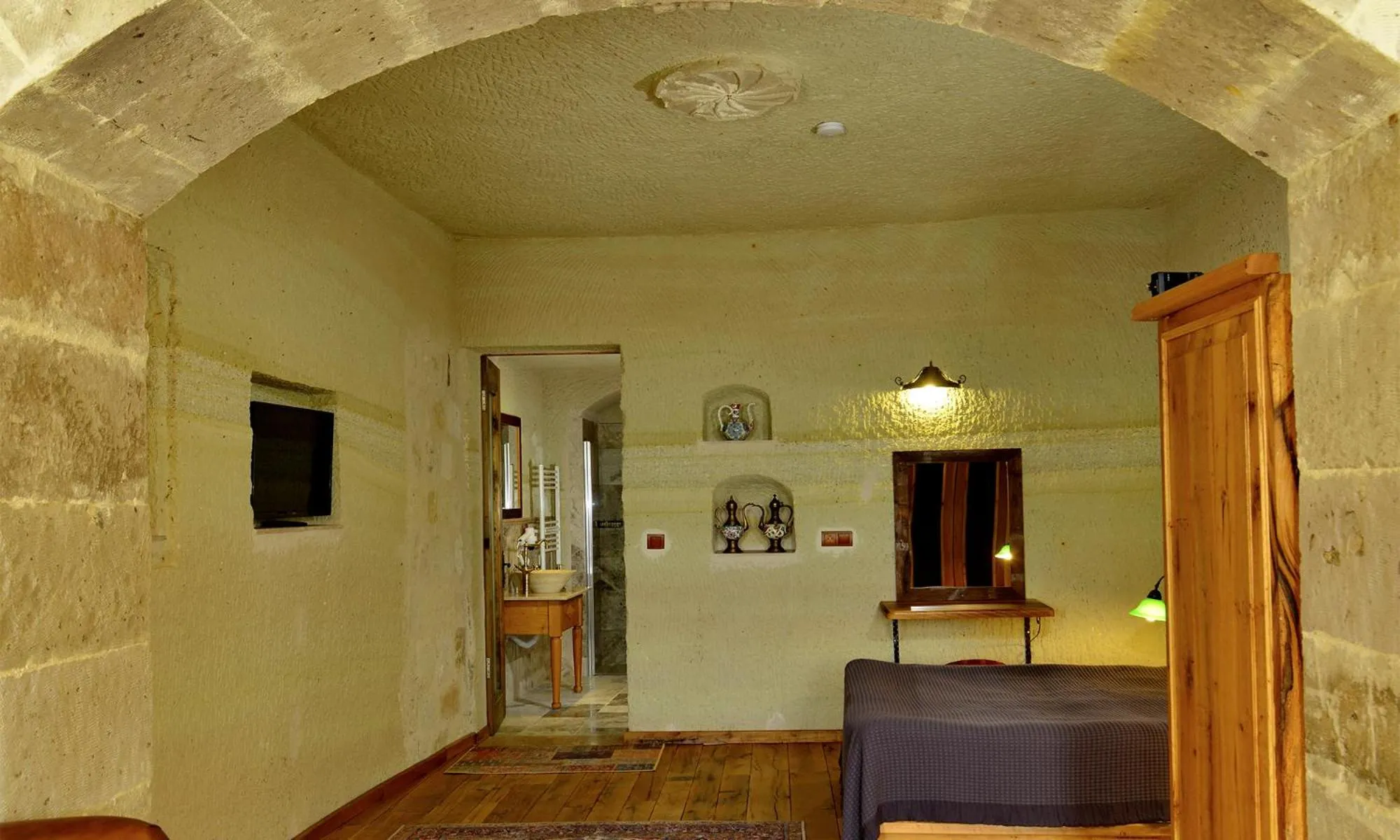 Bed in Seki Cave Suites