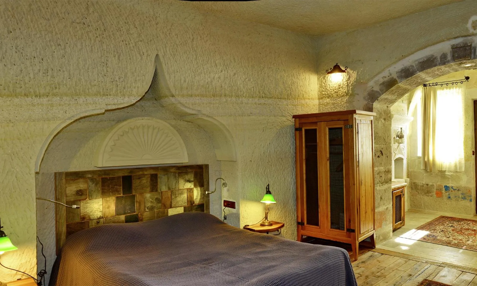 Bed in Seki Cave Suites