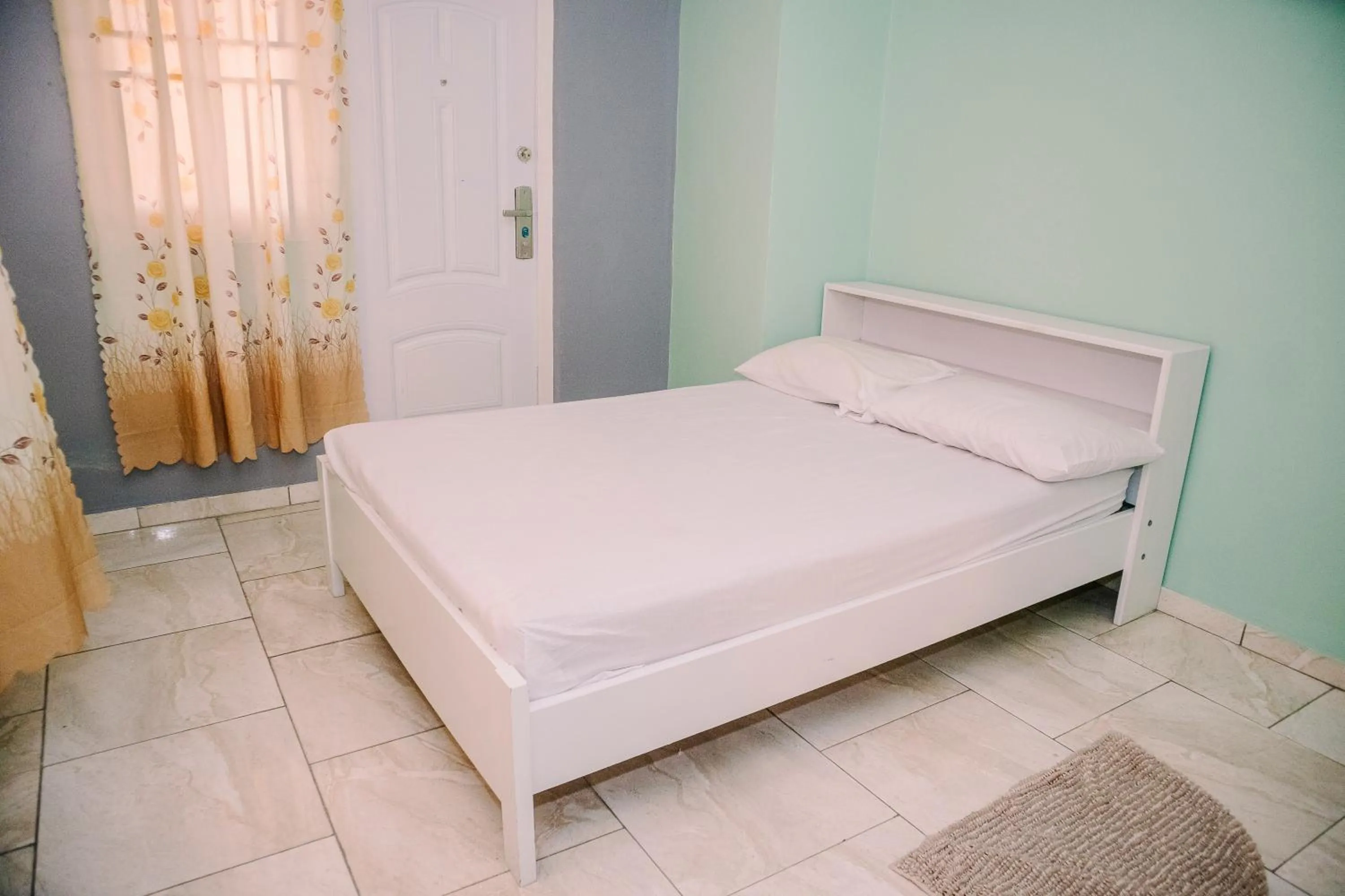 Bed in Happy Holidays Style Residences