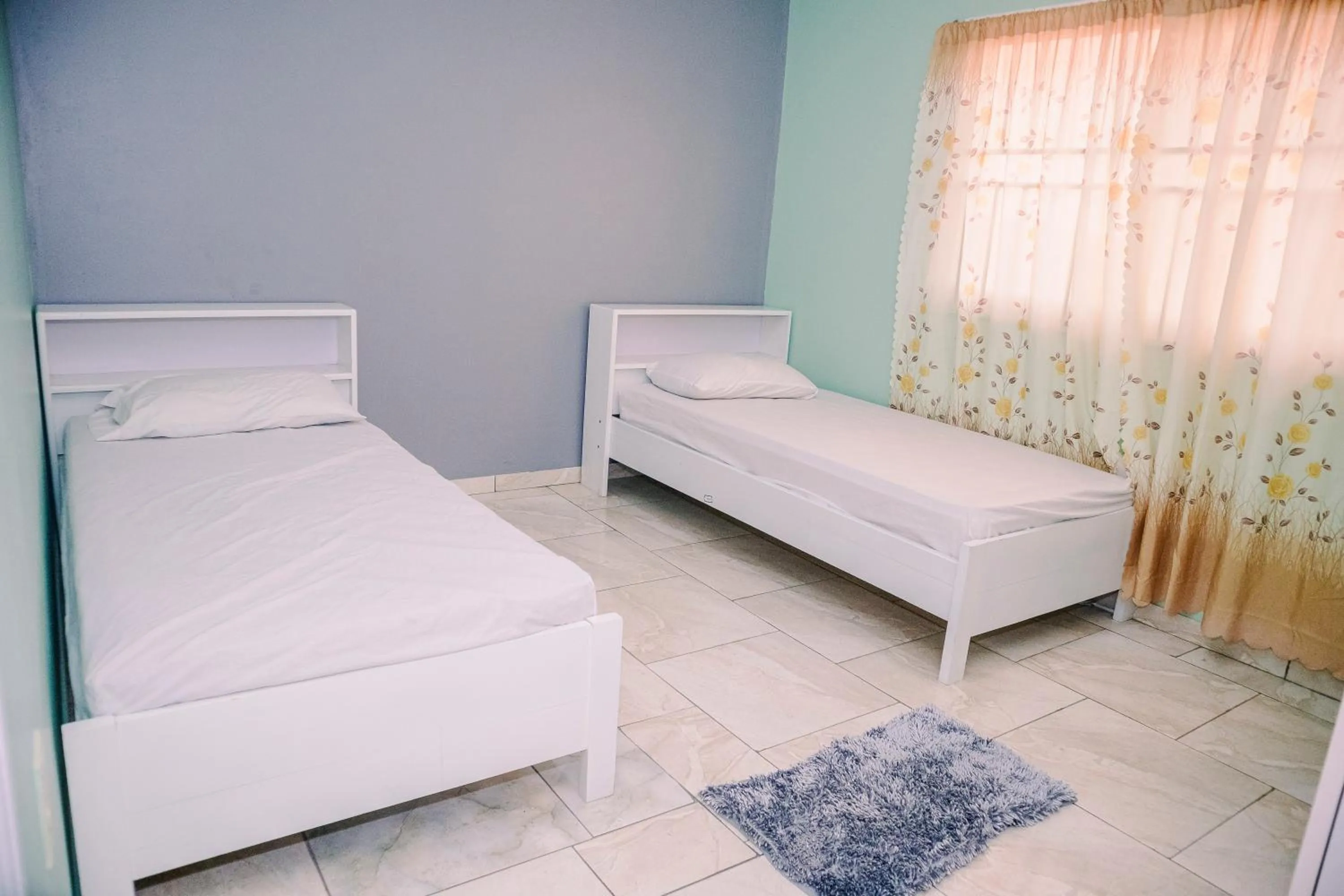 Bed in Happy Holidays Style Residences