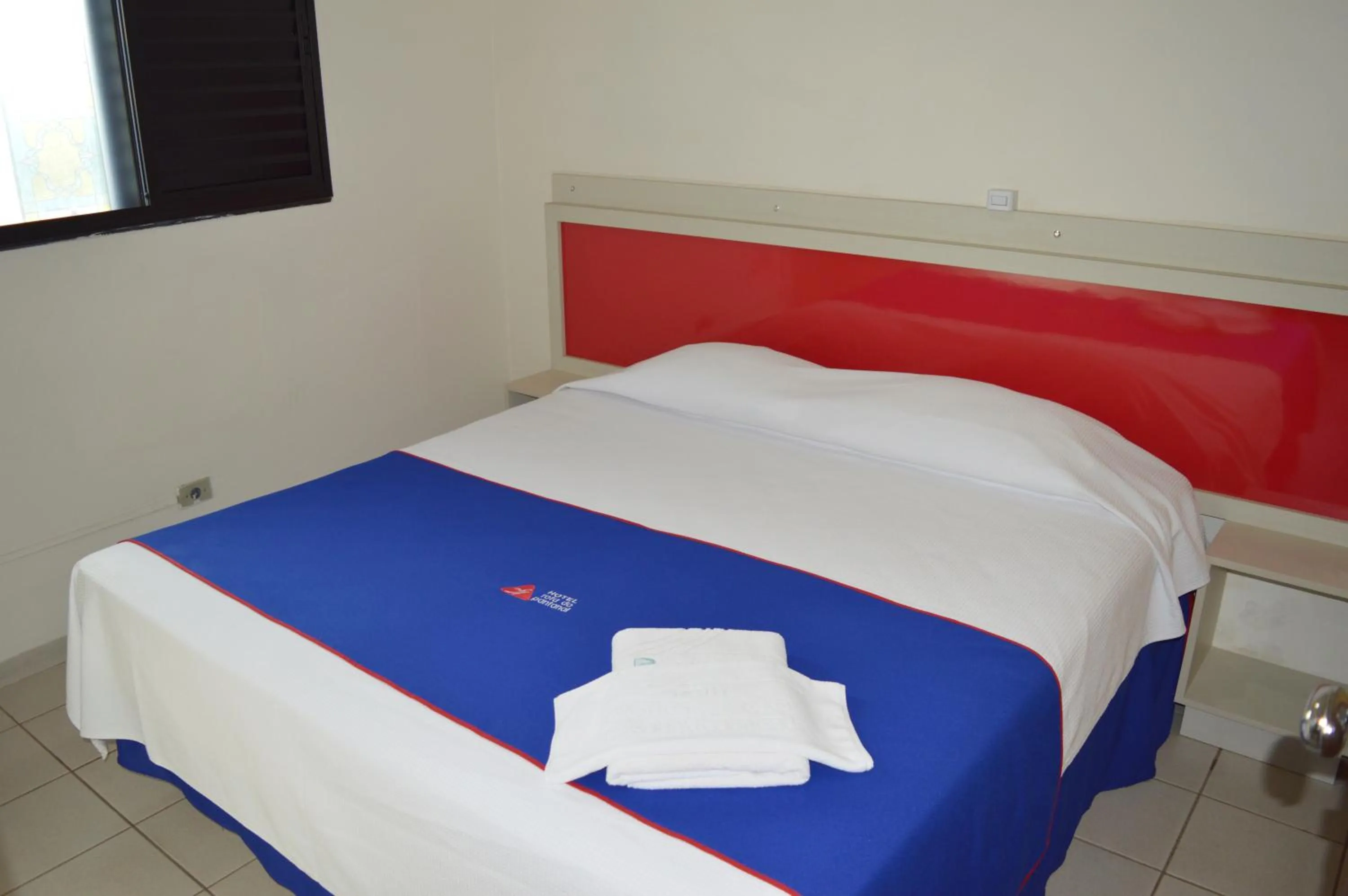 Bed in Hotel Rota do Pantanal