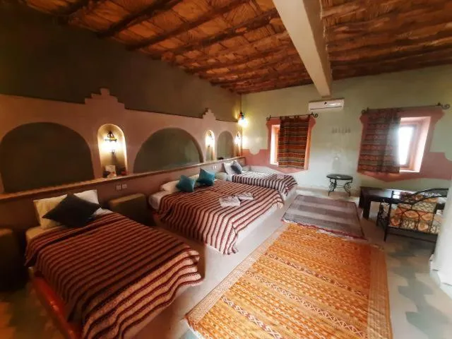 Bed in Maison Merzouga Guest House