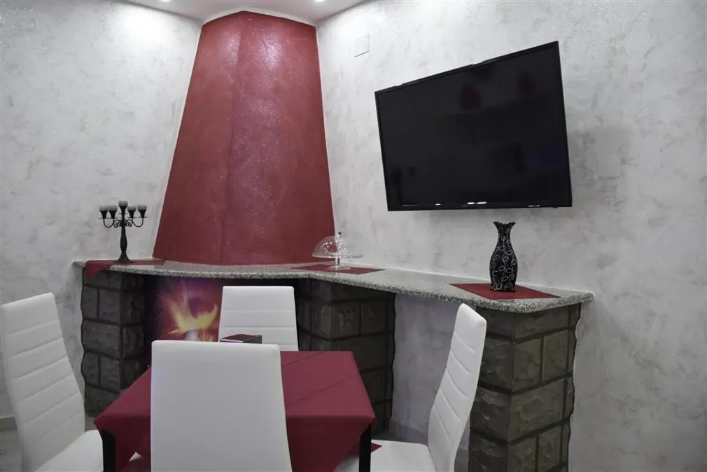 Communal lounge/ TV room in Il Cuore dell'Etna