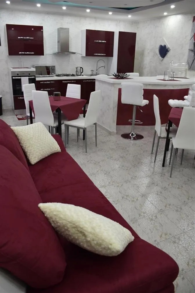 Communal lounge/ TV room in Il Cuore dell'Etna