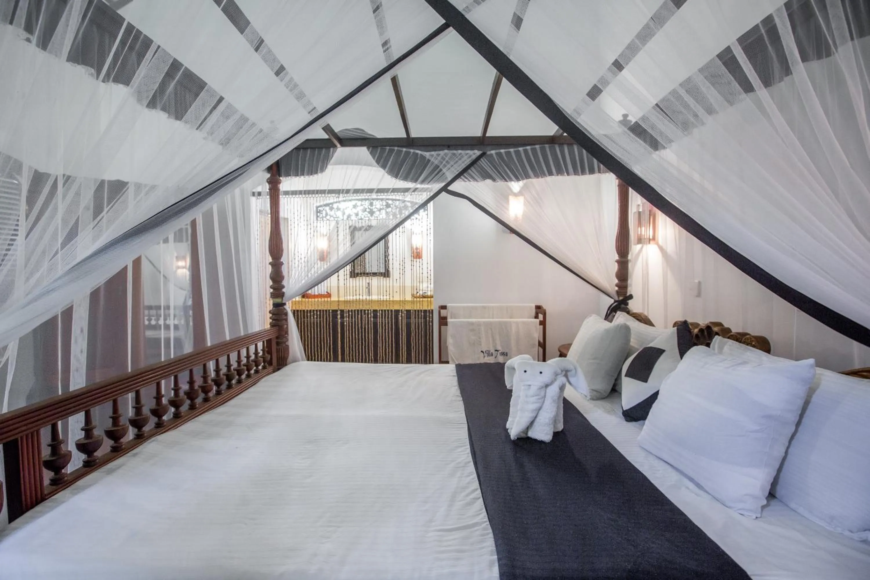 Bed in Villa Tissa Beach Resort