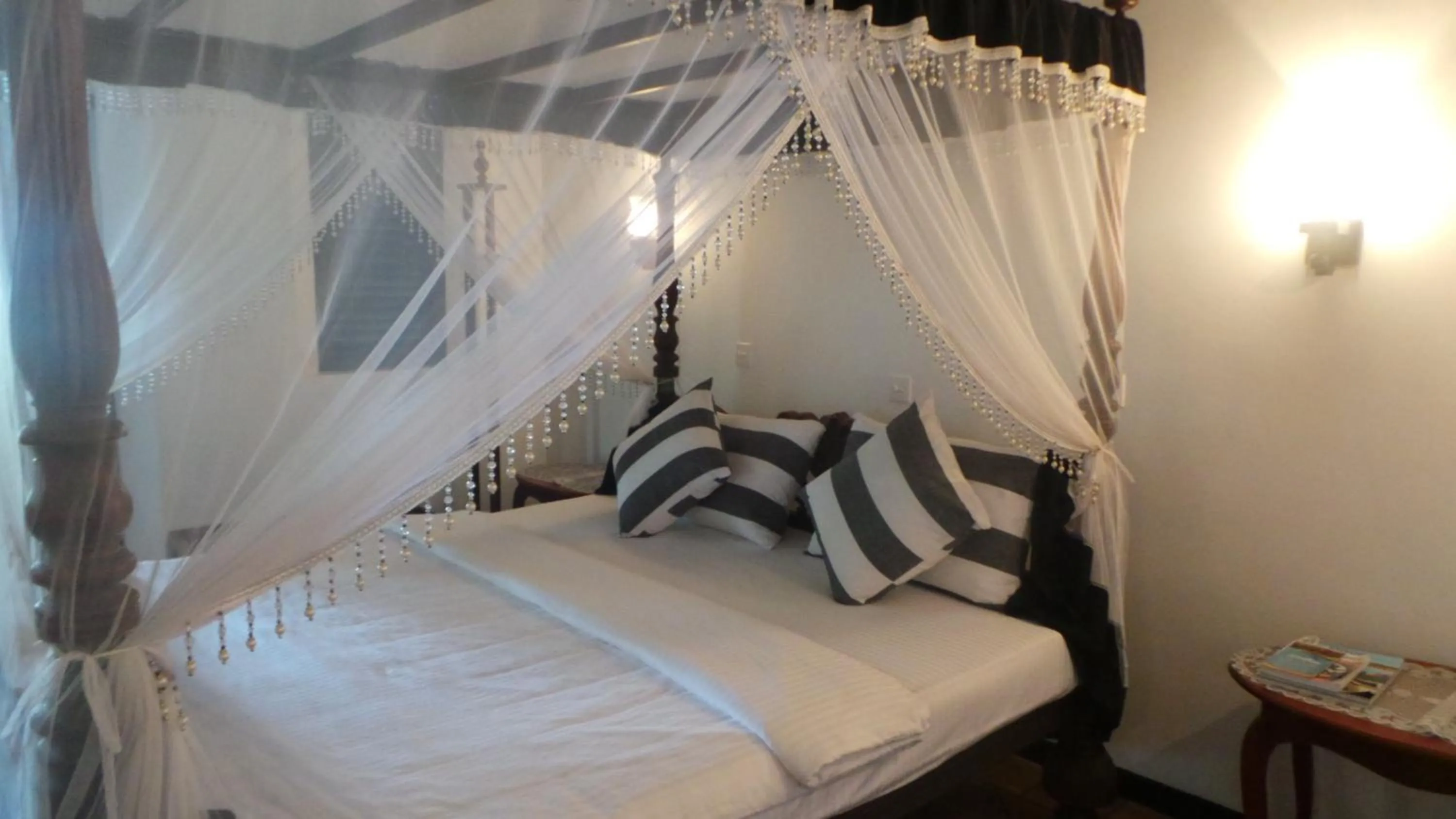 Bed in Villa Tissa Beach Resort