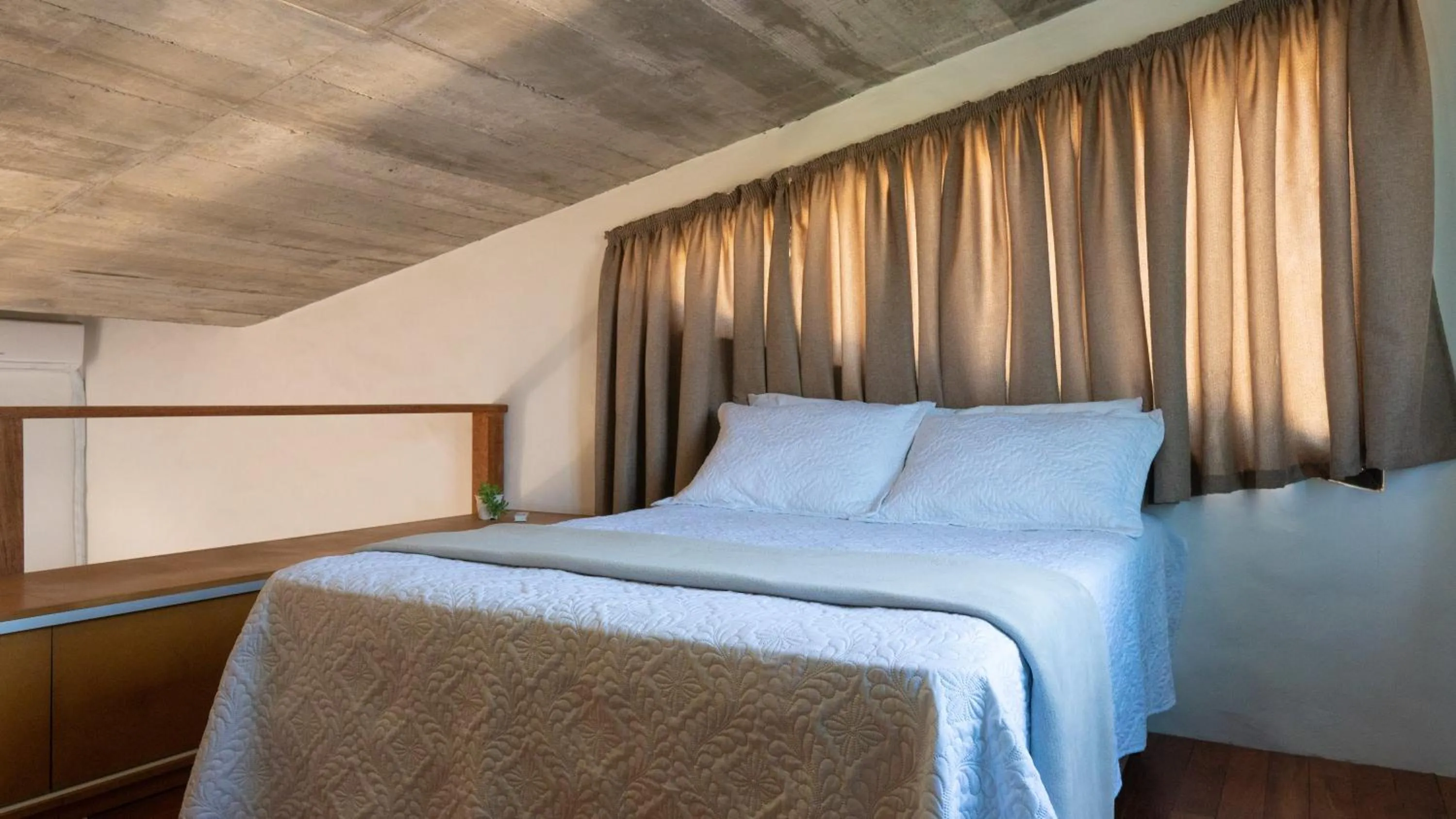 Bed in Pousada Rosa Tropicalia