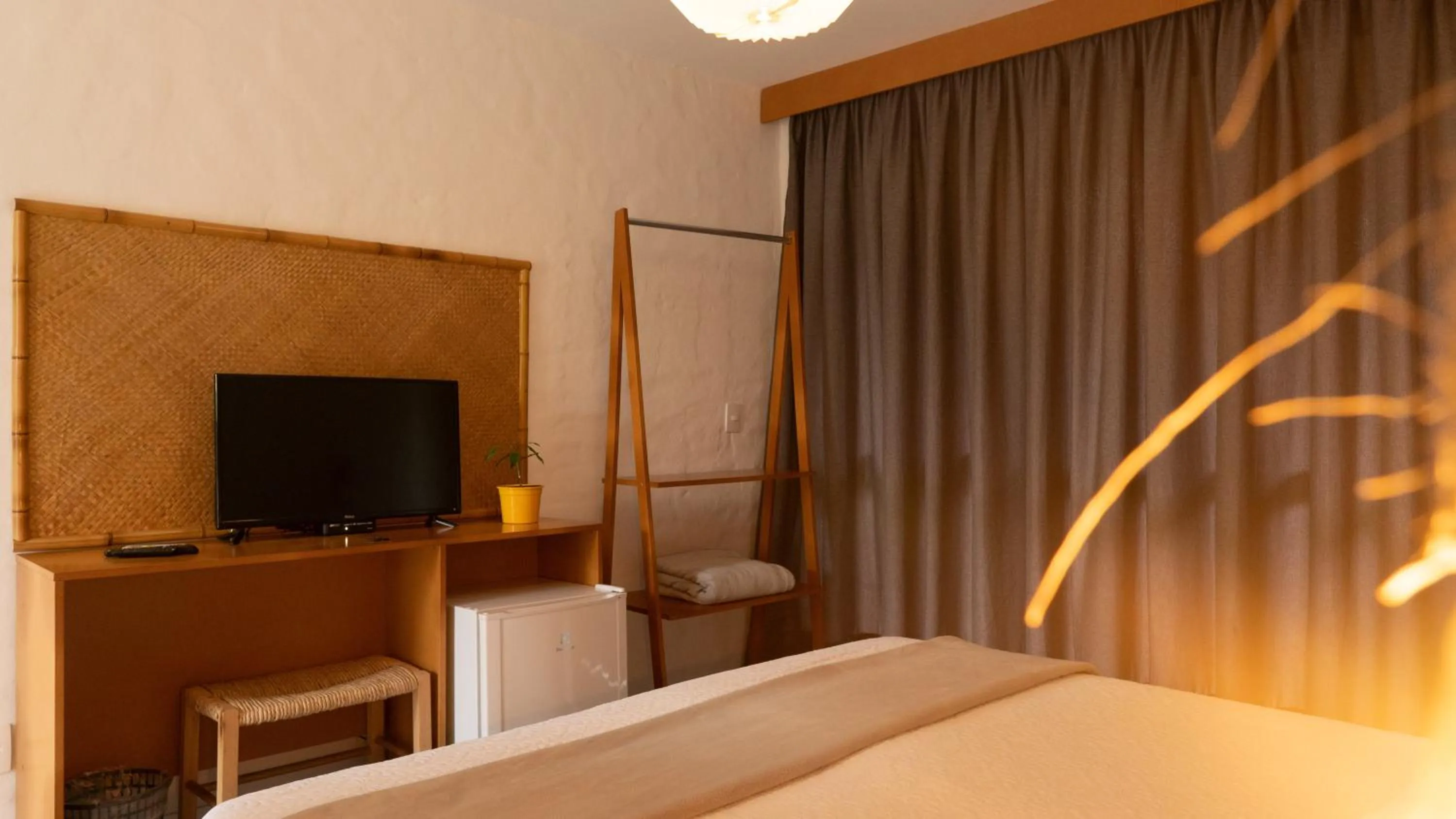 Bed in Pousada Rosa Tropicalia