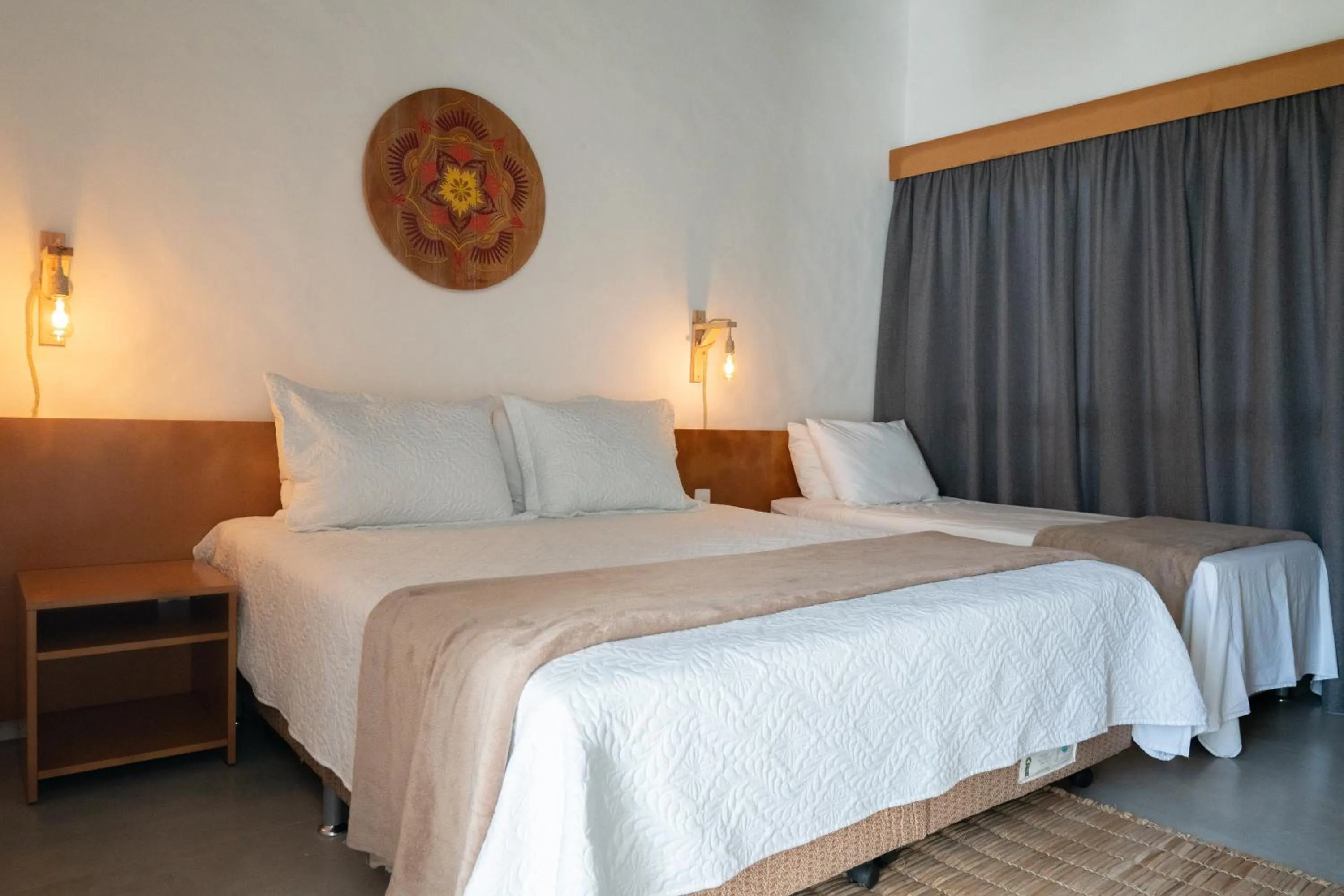 Bed in Pousada Rosa Tropicalia