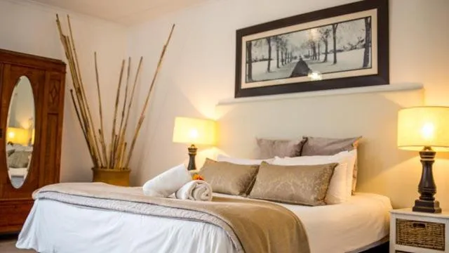 Bed in Radium Hall Guest House