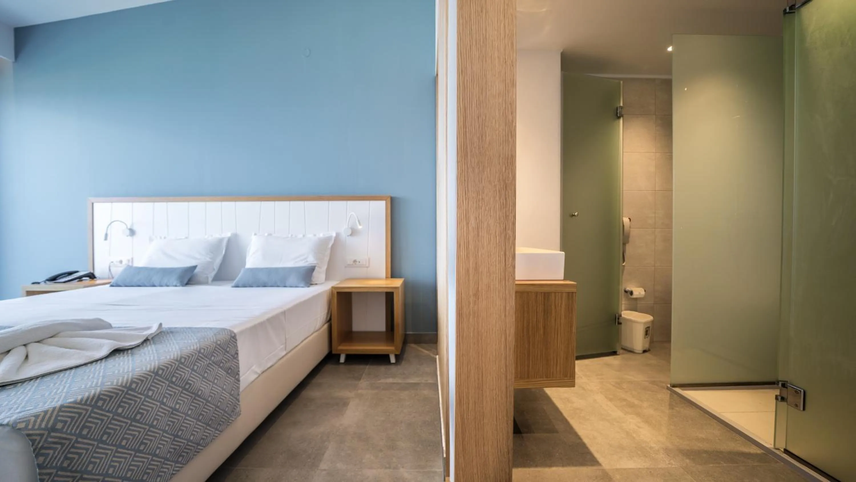 Bedroom in Panorama Village Hotel