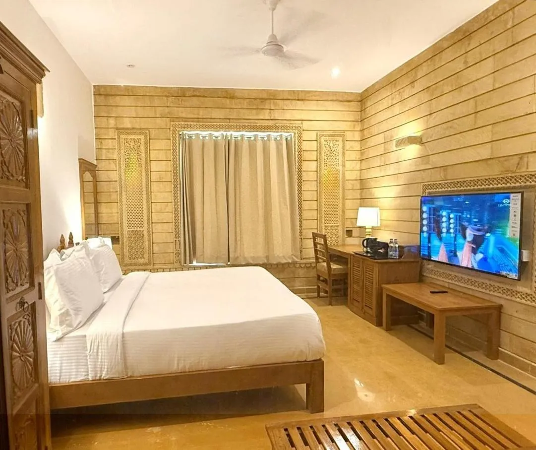 Bed in Hotel Golden Haveli