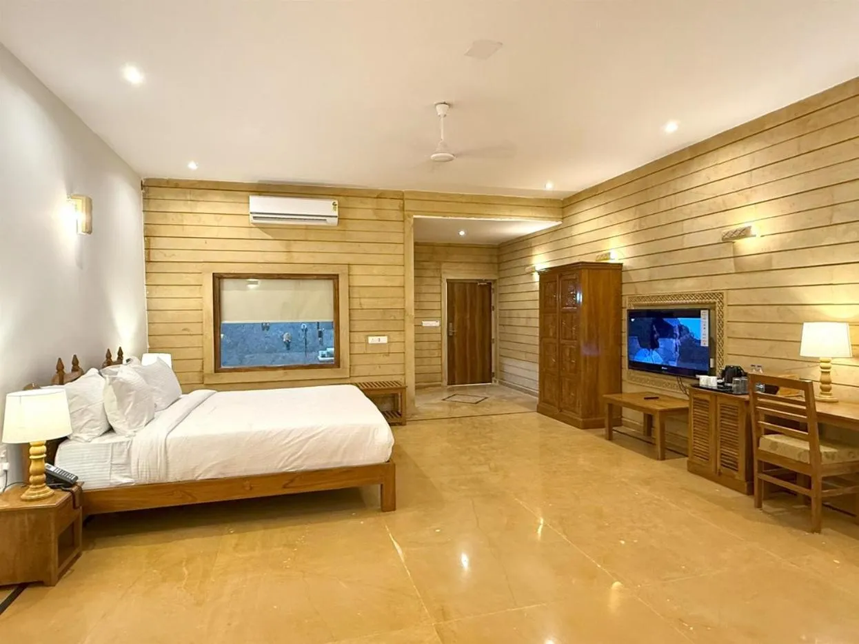 Bed in Hotel Golden Haveli