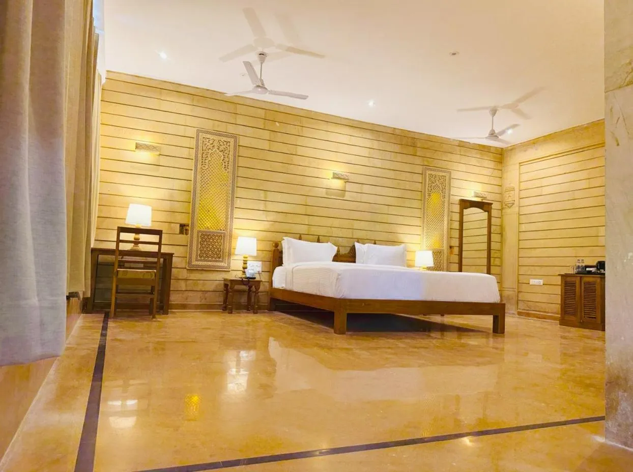 Bed in Hotel Golden Haveli