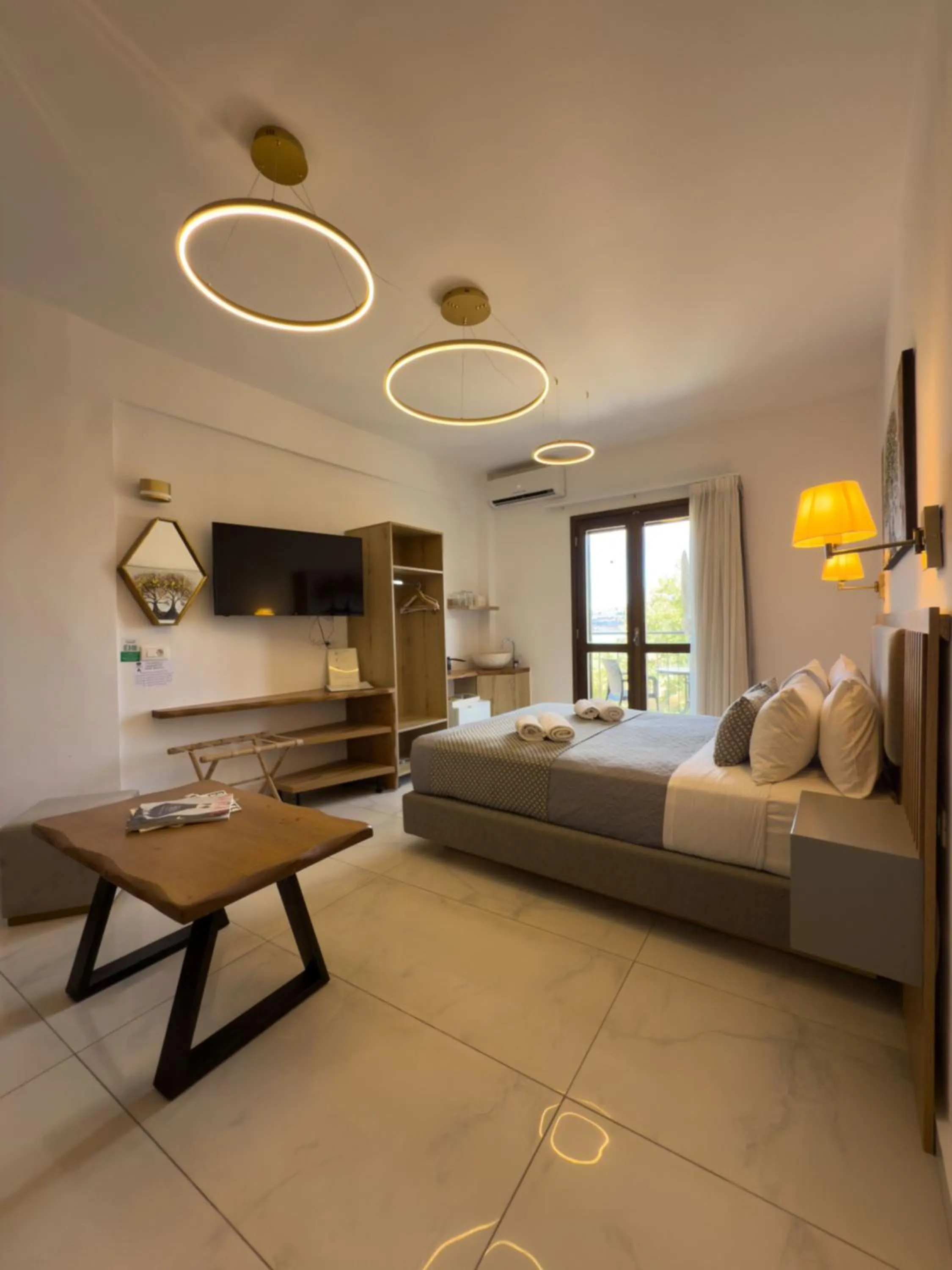 Photo of the whole room, Bed in Deluxe Suites