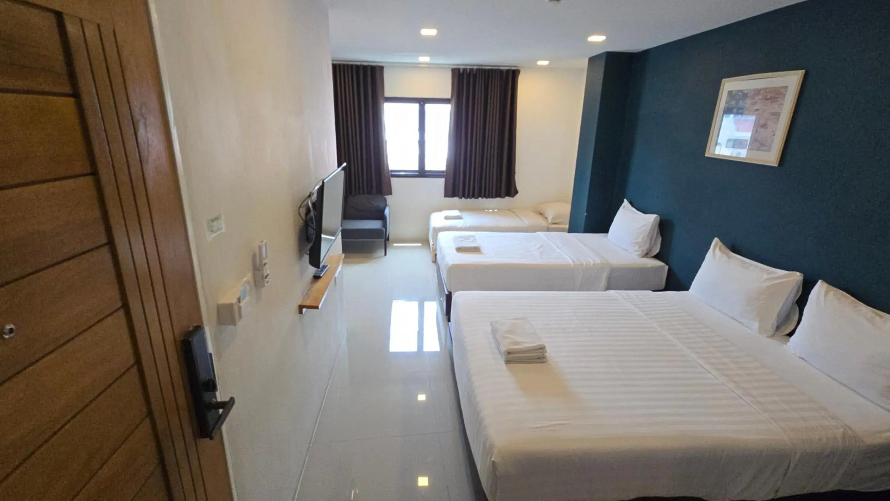 Classic Quadruple Room - Building 2 in Sleepstation at Pratunam Classic Quadruple Room - Building 2 in Sleepstation at Pratunam