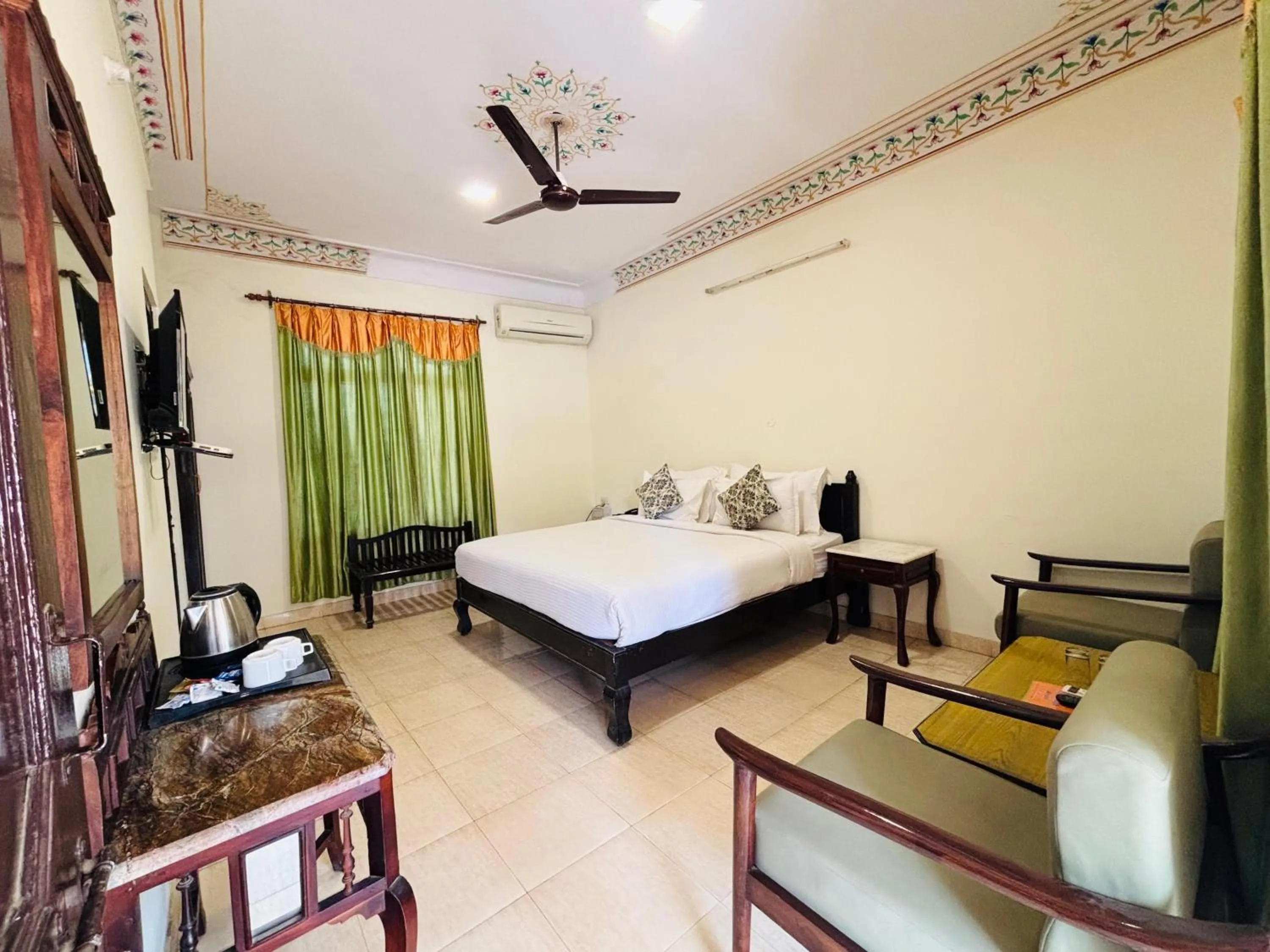 Bed in Sajjan Bagh Resort