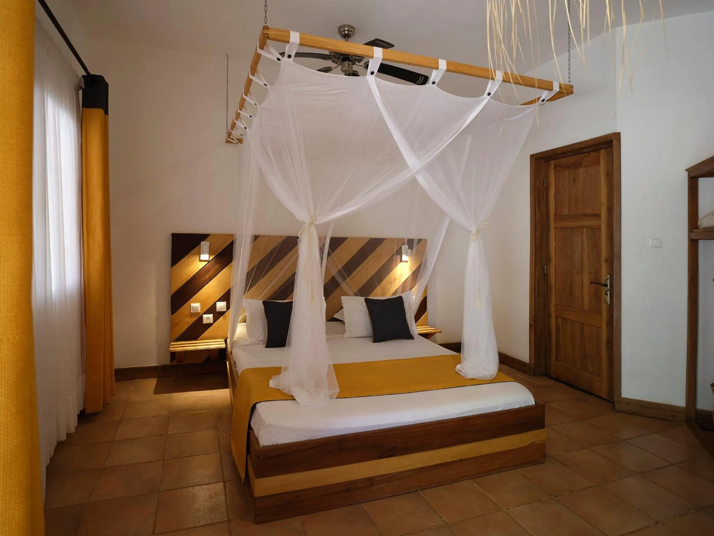 Photo of the whole room, Bed in Antsanitia Resort