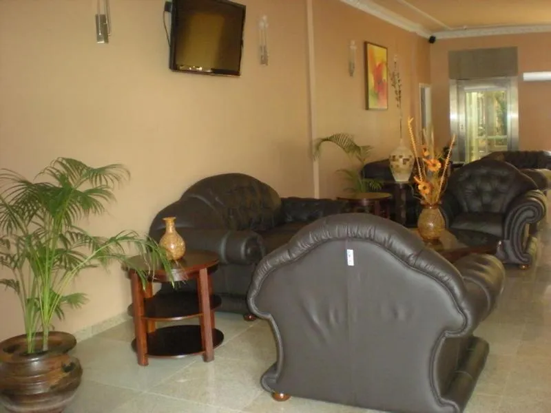 Communal lounge/ TV room in Sheva Hotel