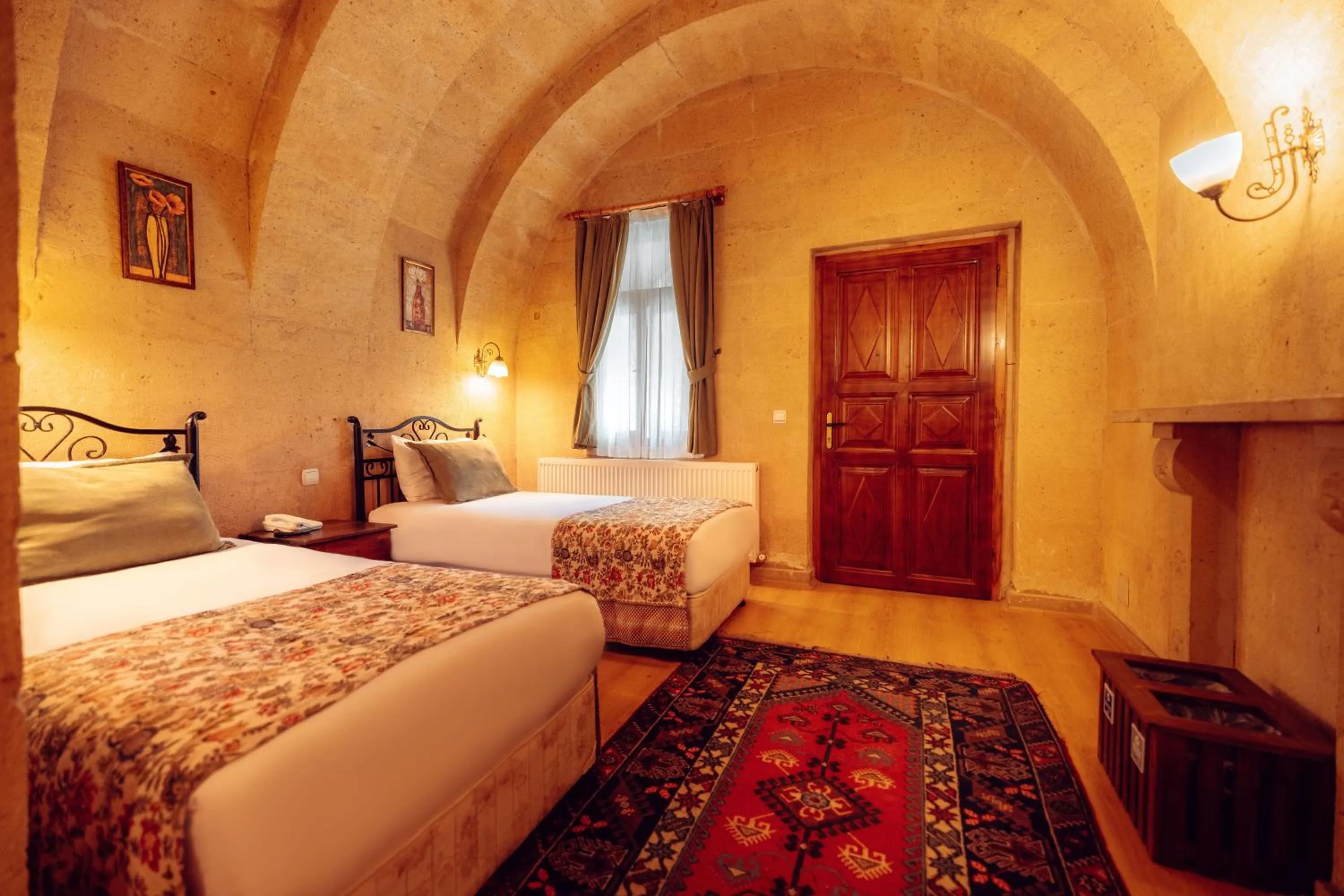 Bed in Melis Cave Hotel