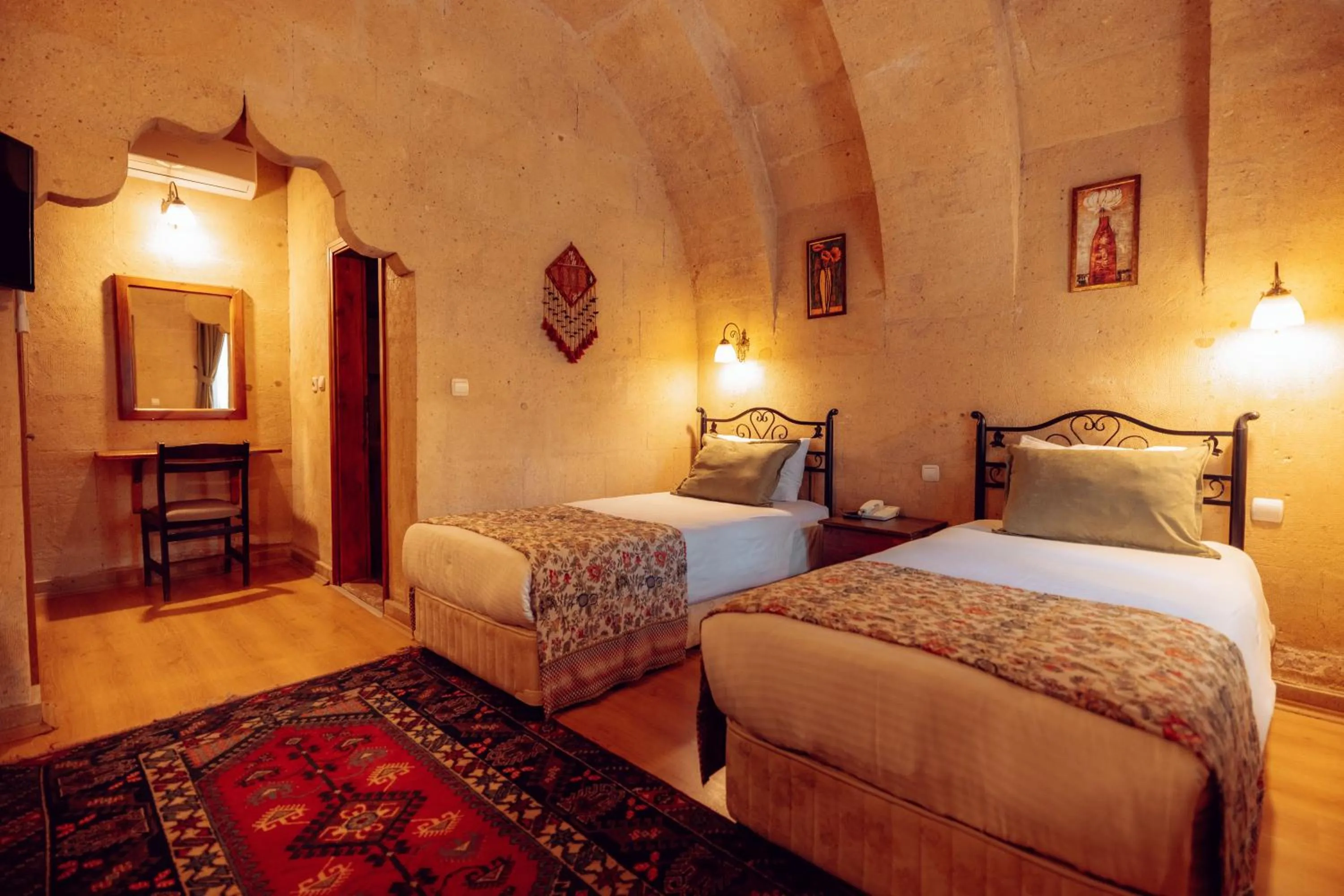 Bed in Melis Cave Hotel