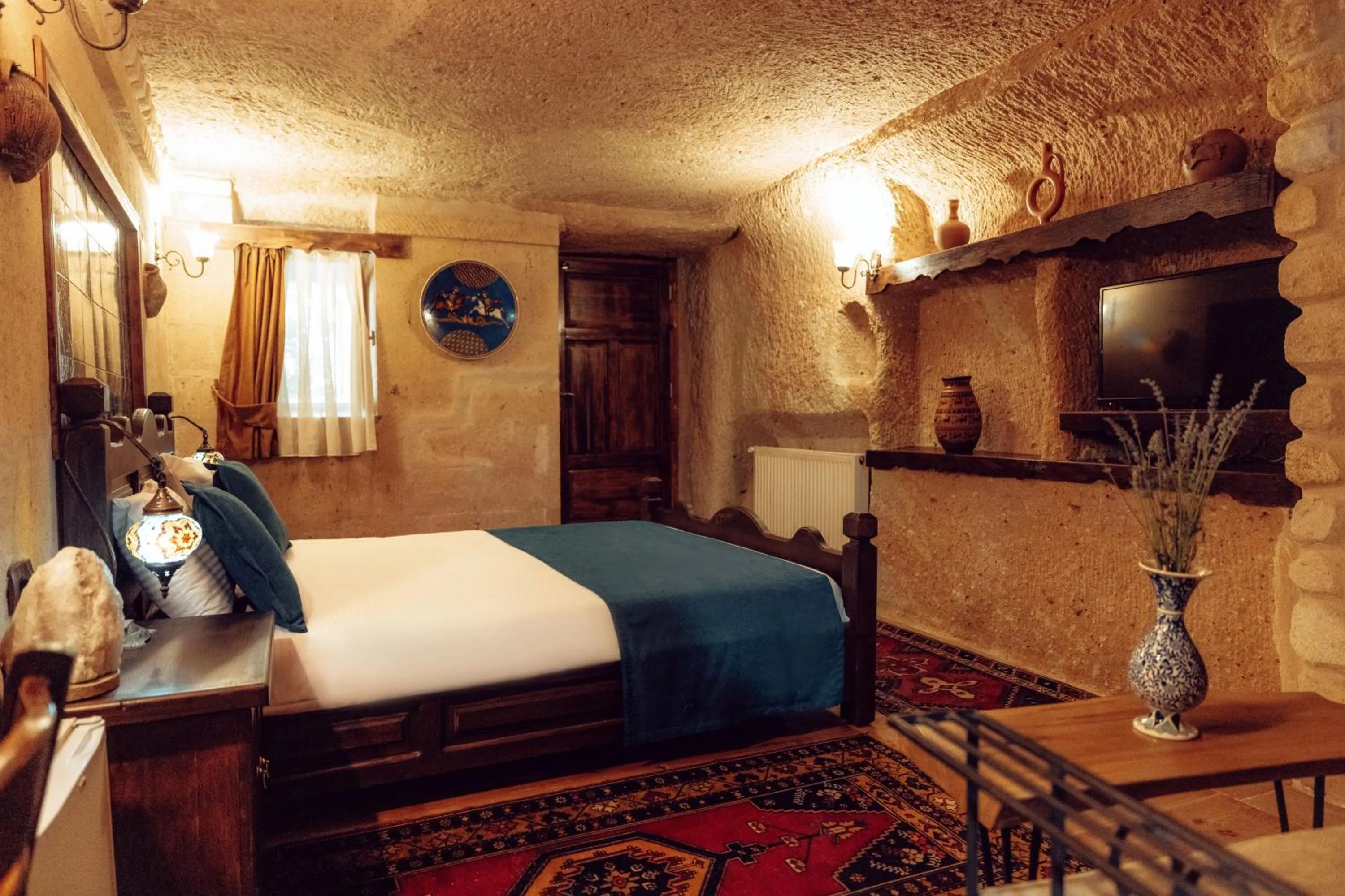 Bed in Melis Cave Hotel