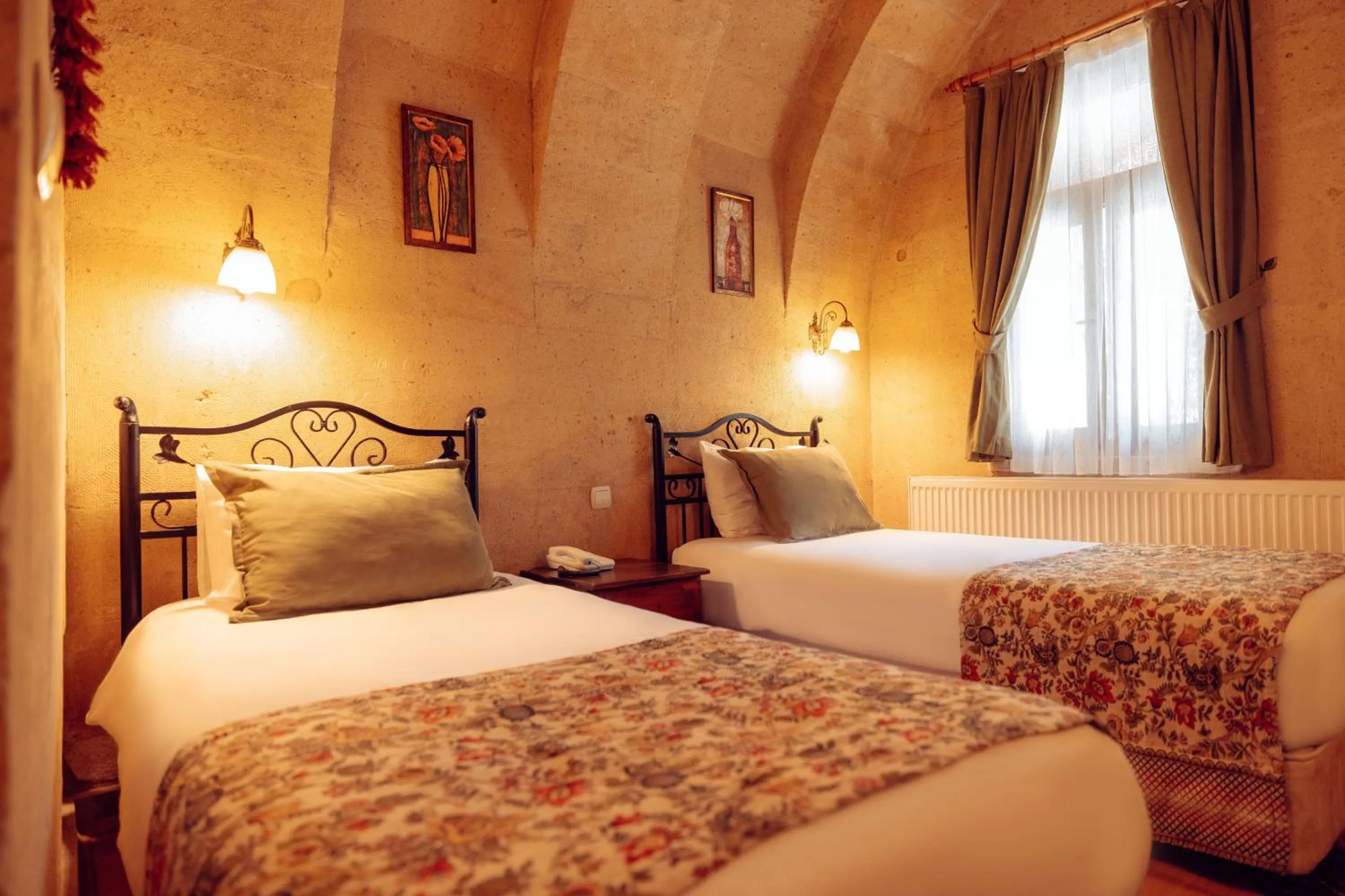 Bed in Melis Cave Hotel