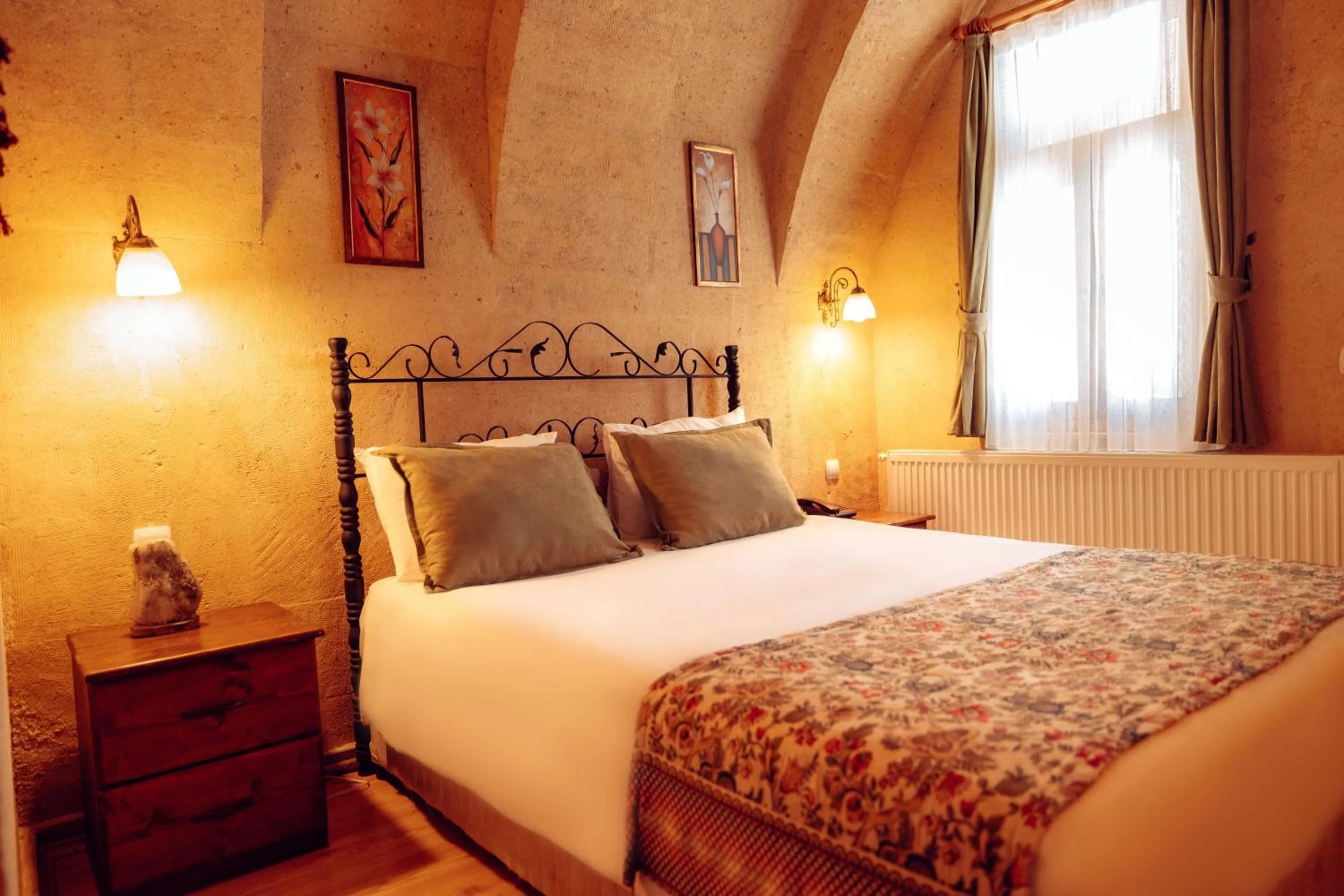 Bed in Melis Cave Hotel