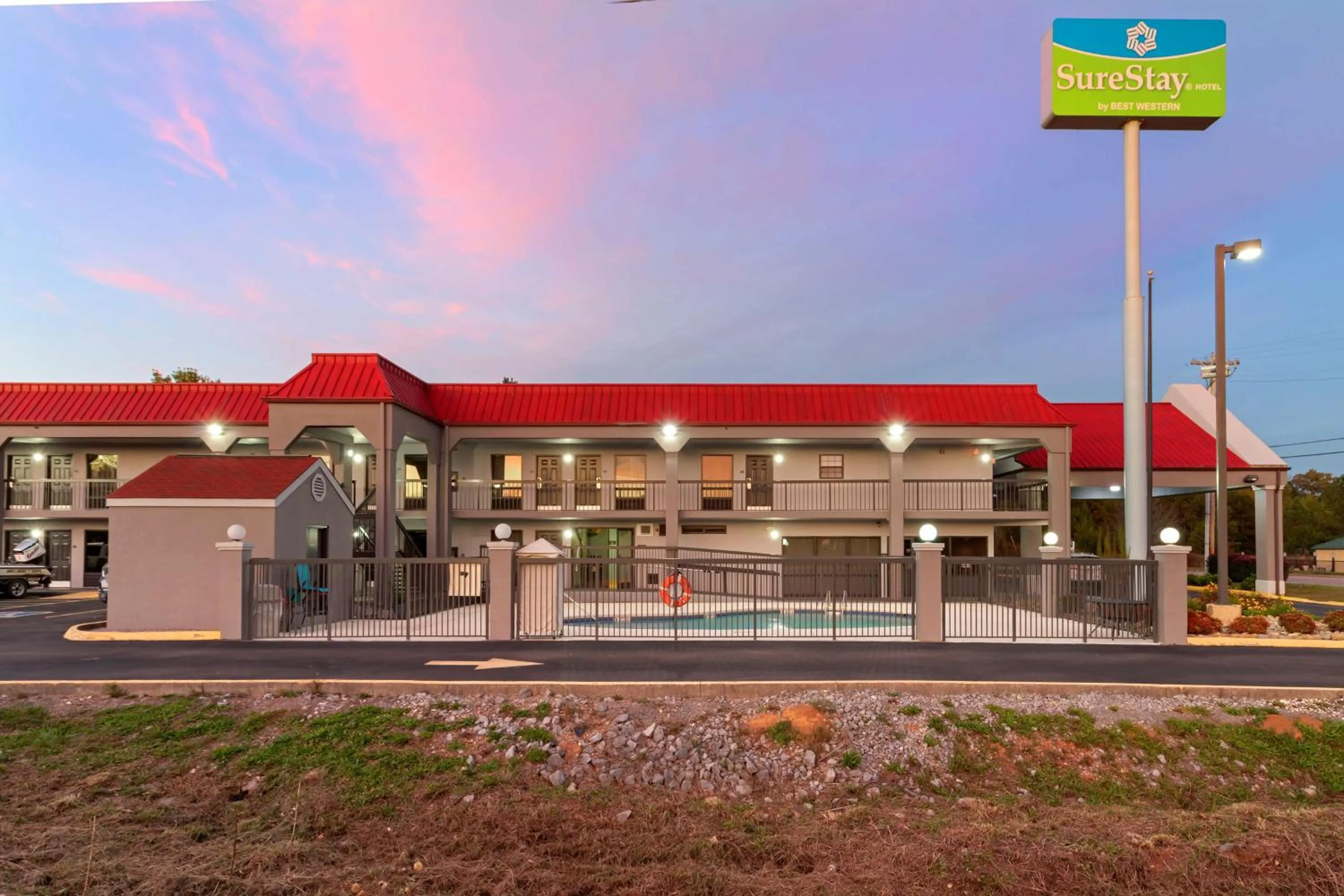 Property building in SureStay Hotel by Best Western Lenoir City