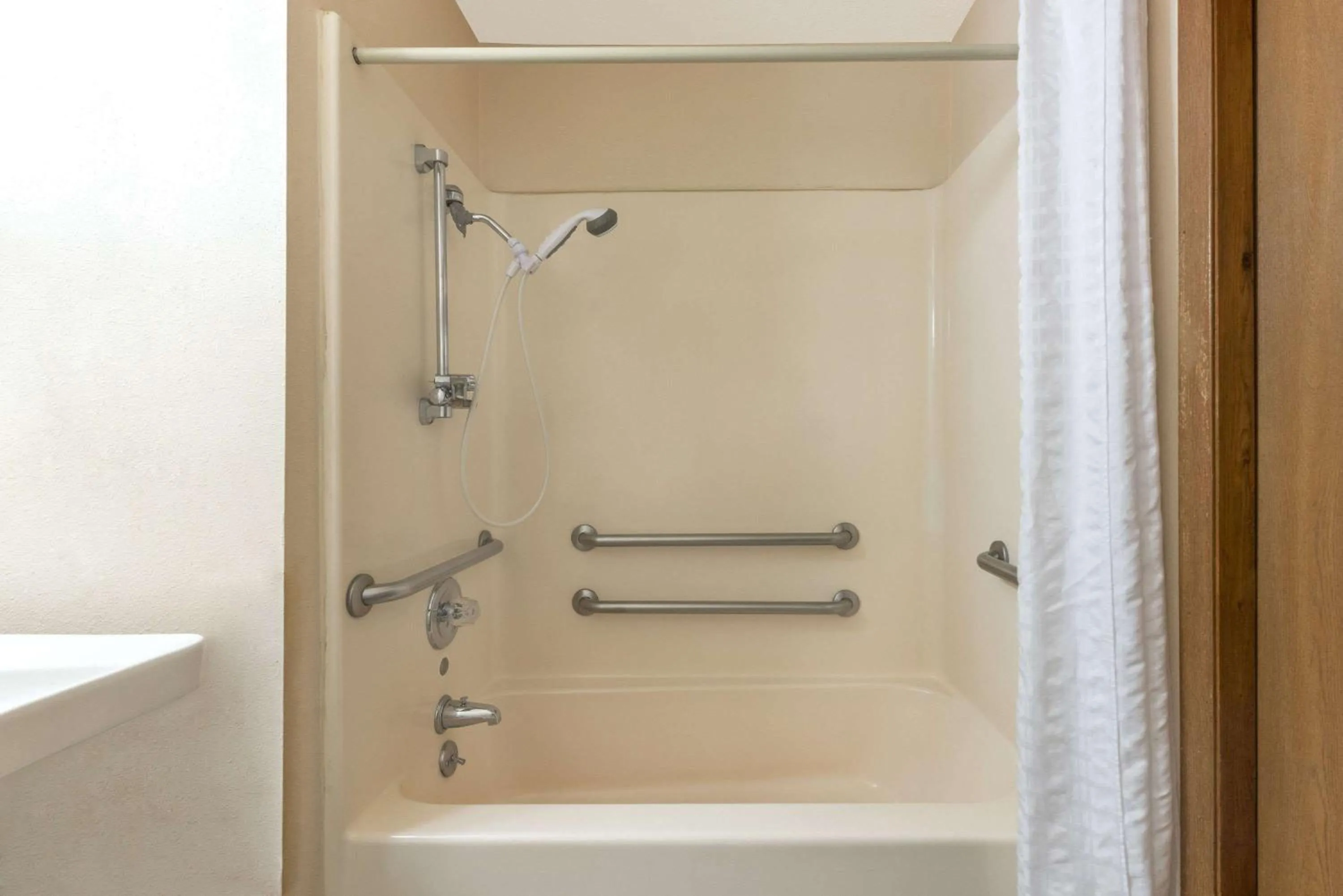 Bathroom in Super 8 by Wyndham Poplar Bluff Missouri