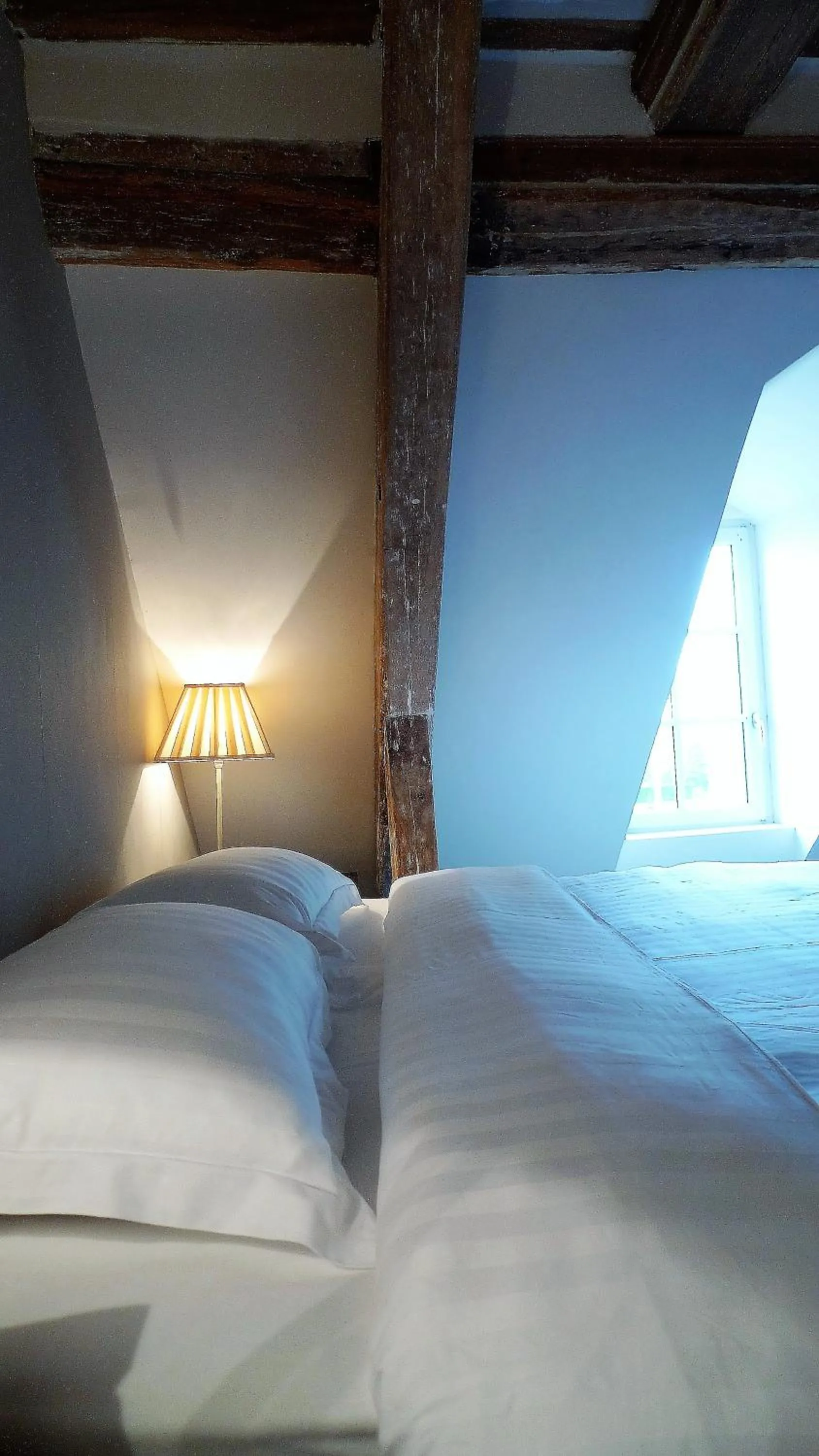 Bed in Les chambres de l'Abbaye