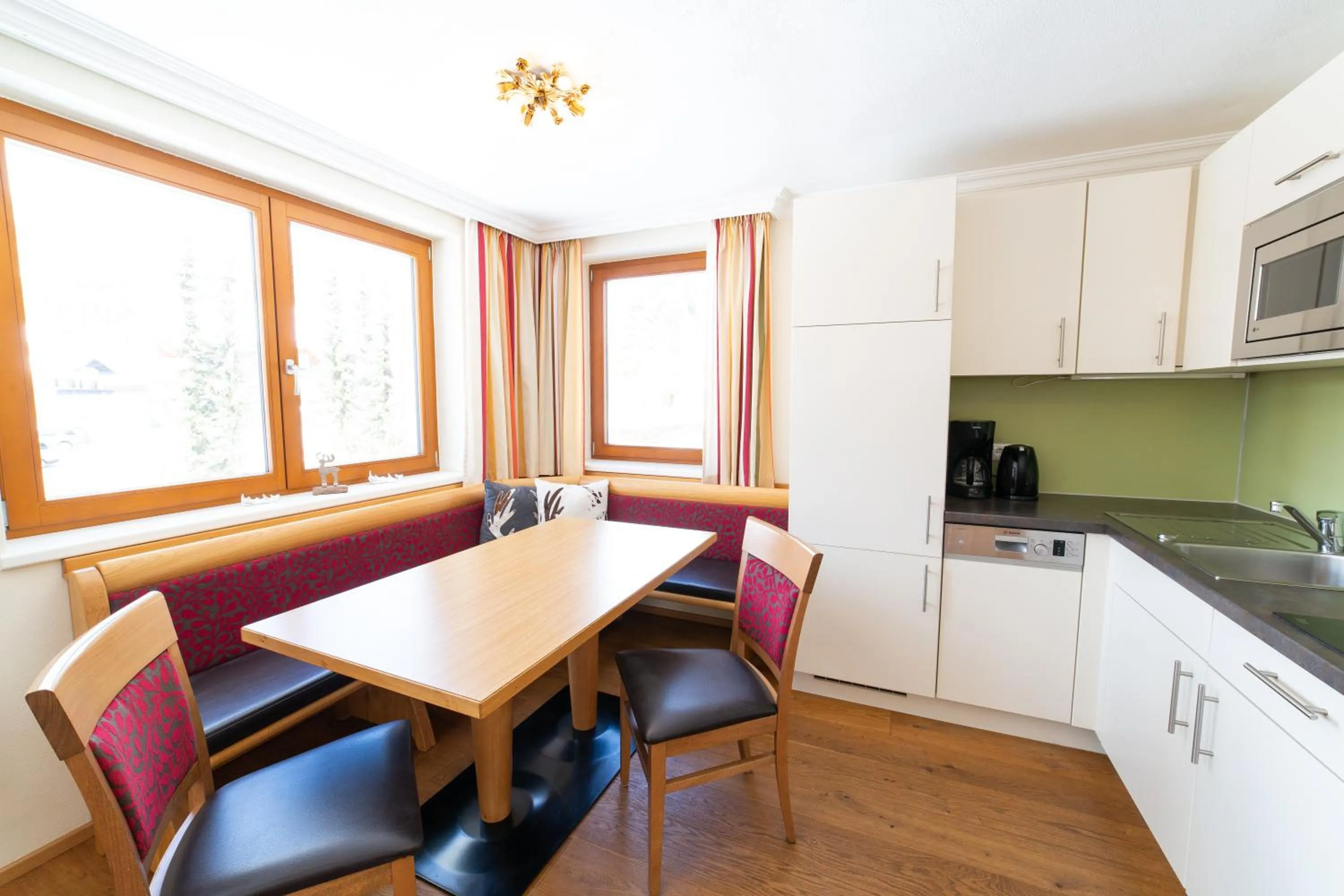 Kitchen or kitchenette in Aparthotel Hirschenau