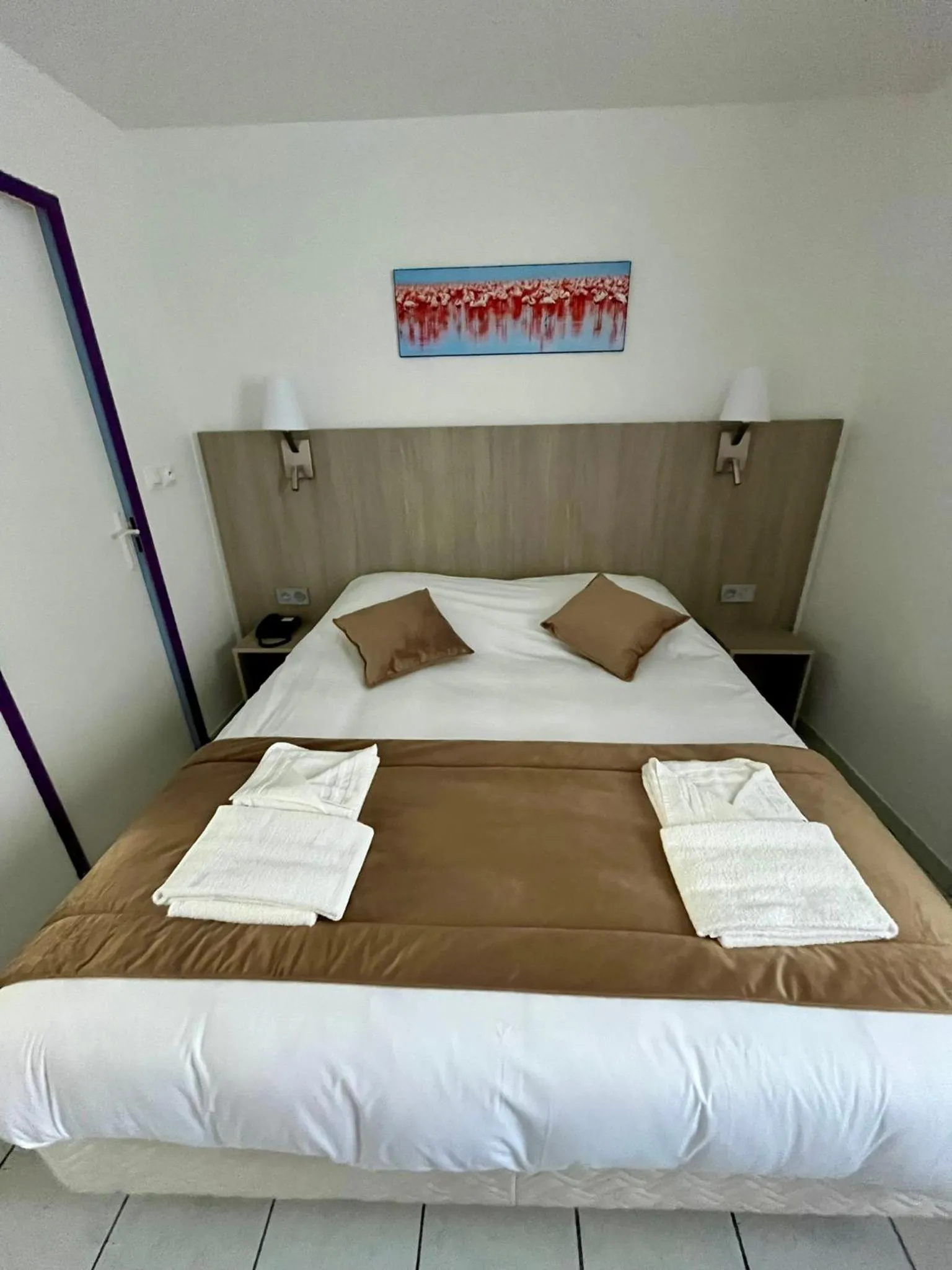 Bed in Hôtel Les Arcades