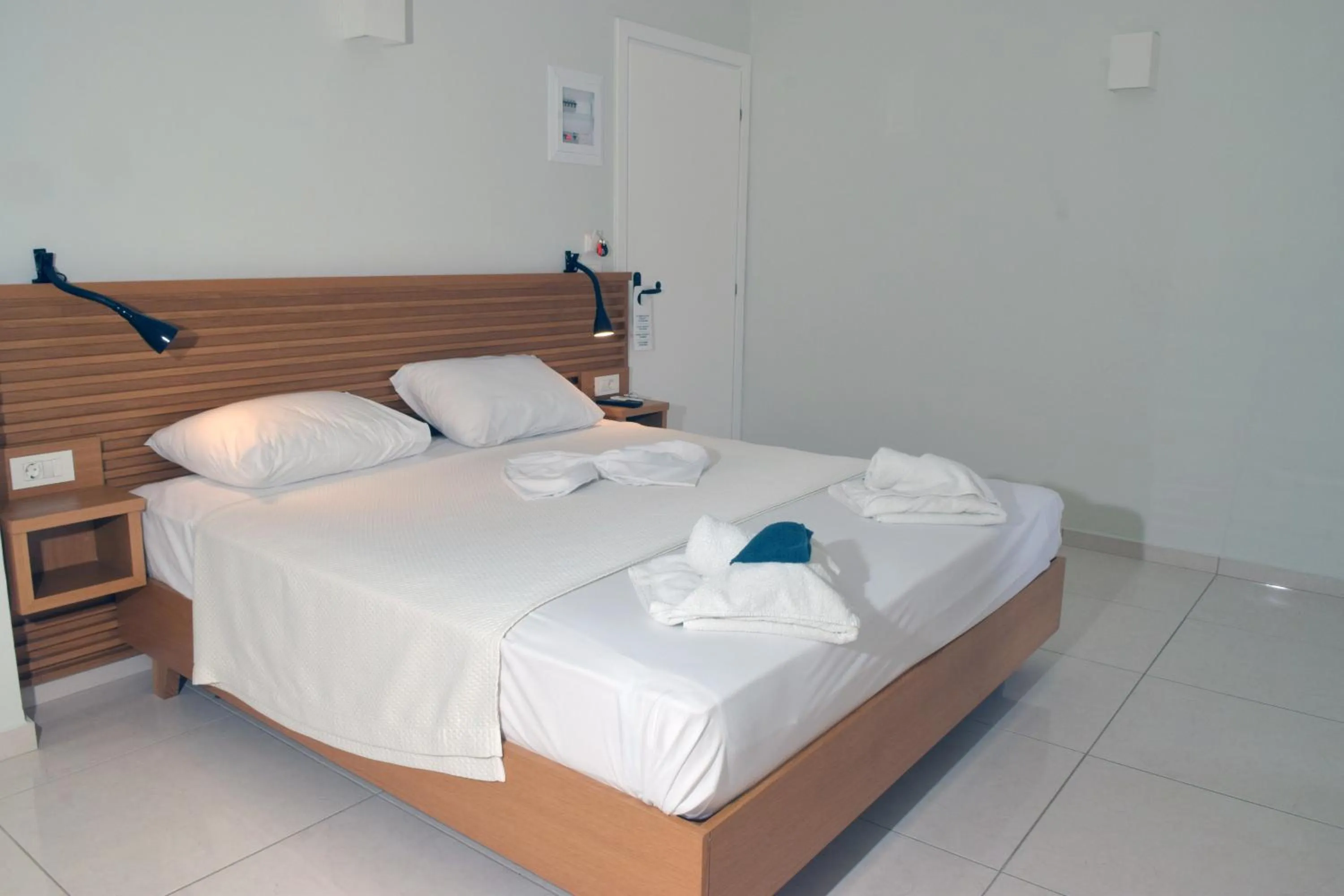 Bedroom, Bed in Mithos Premium Rooms
