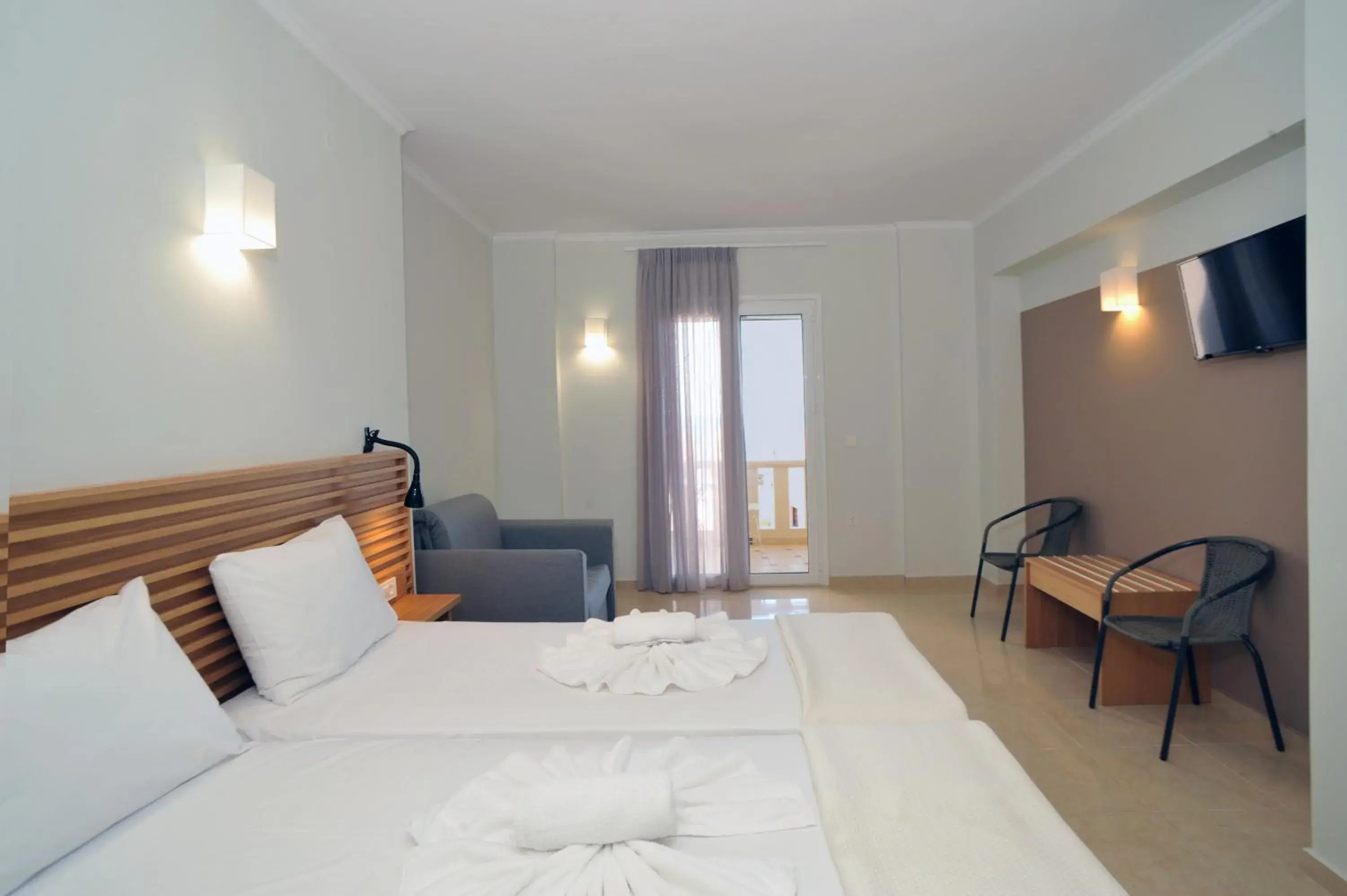 Standard Triple Room with Sea View in Mithos Premium Rooms Standard Triple Room with Sea View in Mithos Premium Rooms