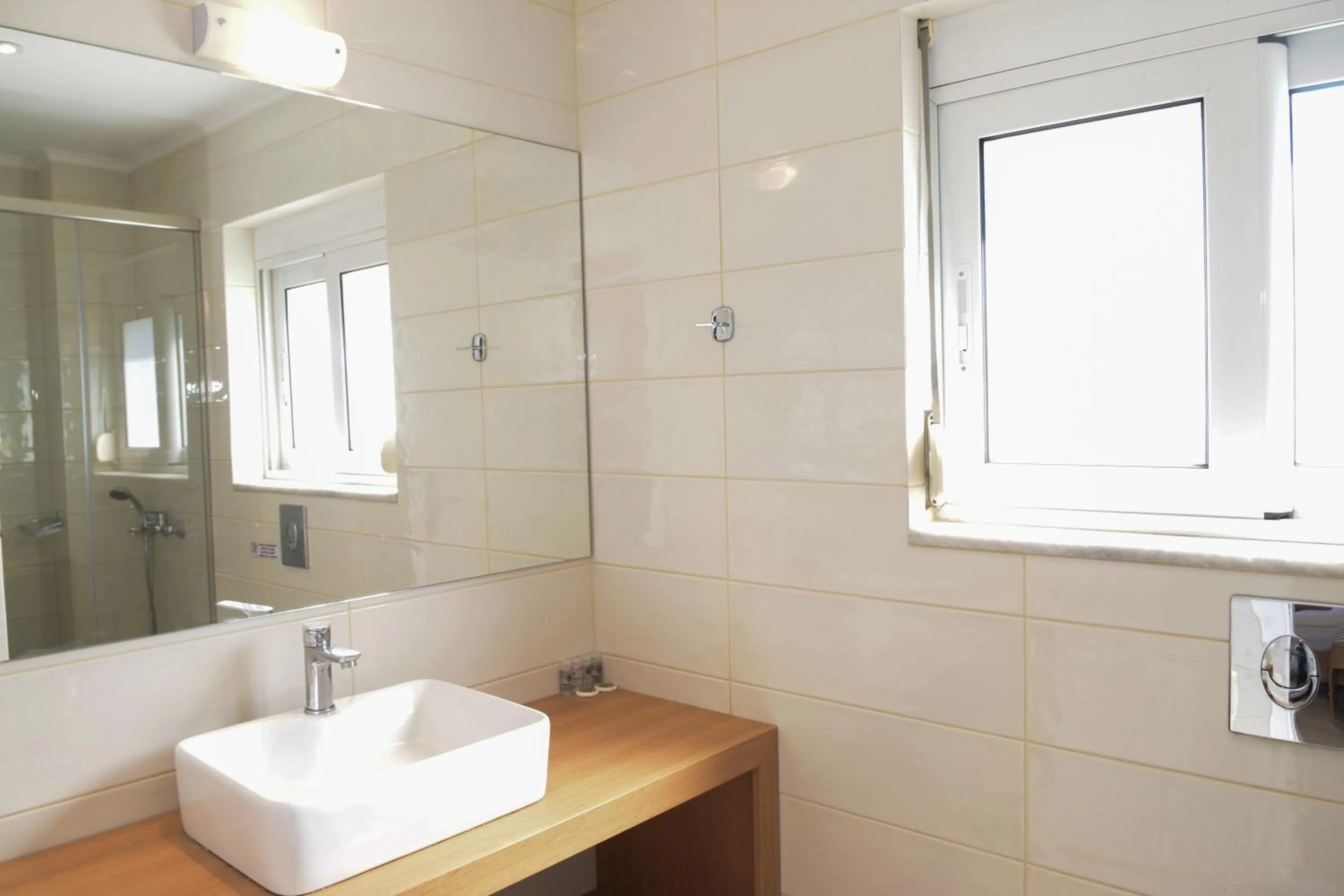 Toilet in Mithos Premium Rooms